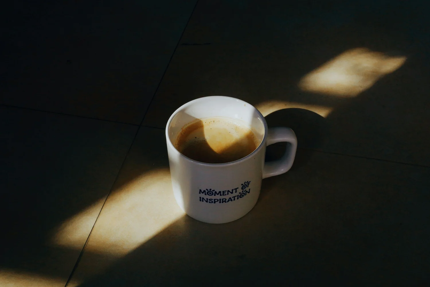 Morning coffee mug in a beam of sunlight