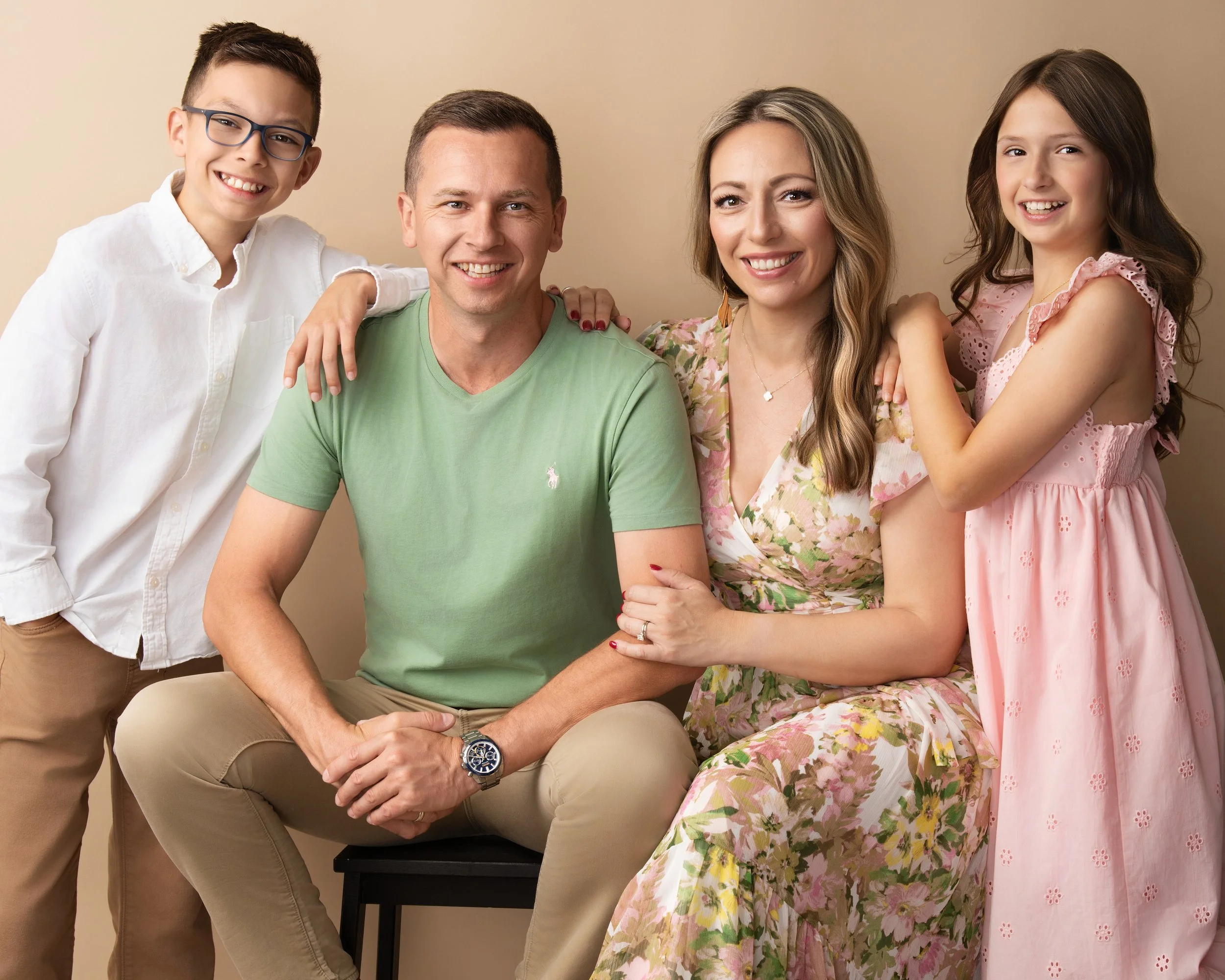 Orlando family portrait photography featuring a modern studio portrait of a family of four by Agata Powers Photography.