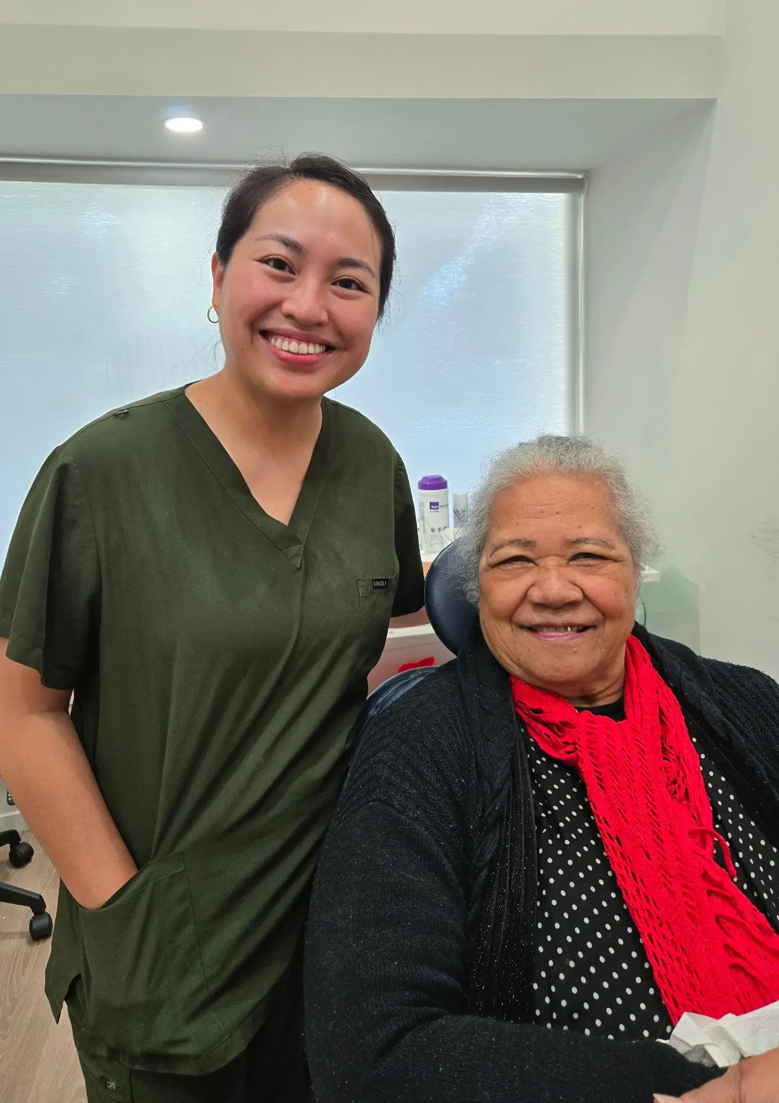 Caira Uy, Licensed Clinical Dental Technician with a happy patient