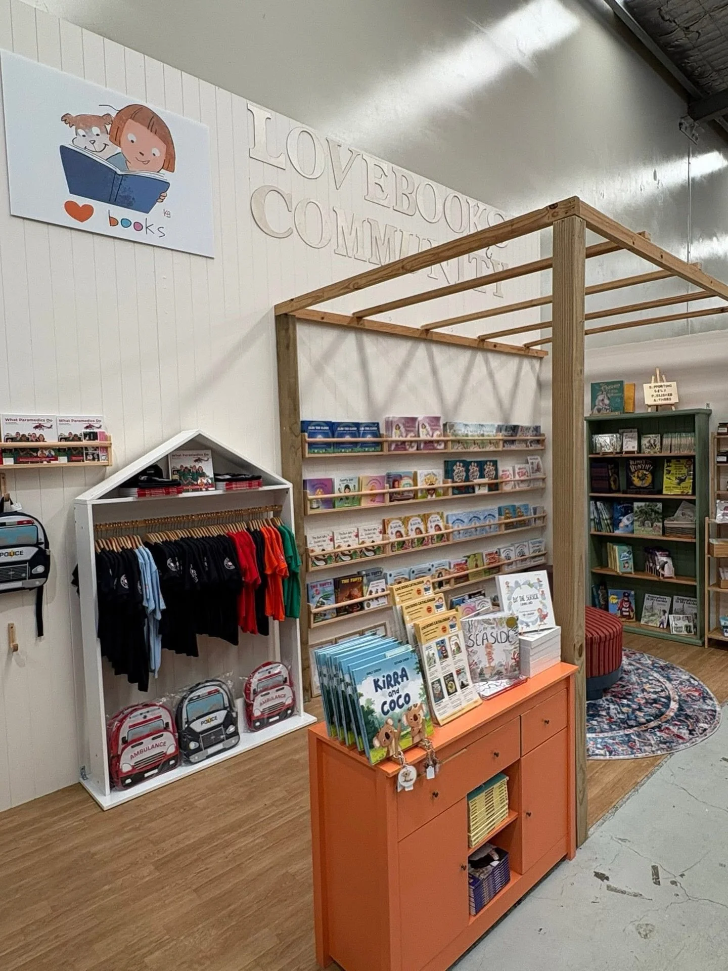 Have you seen the new @lovebookscommunity stand at @vendmarketplace yet? 👀

Our new spot features so many wonderful authors and now stocks some merchandise too! 👚📚

Most importantly our little reading chair and &lsquo;read me&rsquo; copies are sti