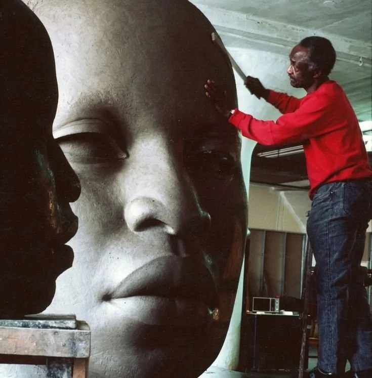 John Wilson in the studio with “eternal presence” (1986) captured by David Schaefer.

this renowned piece depicts scale as resistance, craft as devotion and representation as infrastructure.

“eternal presence” wasn’t about monumentality for spectacl