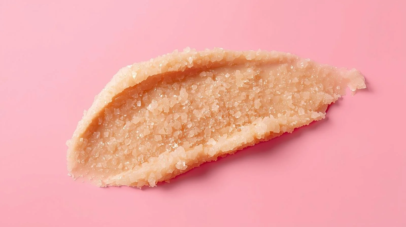 tan sugar scrub smeared pink background (1).jpg