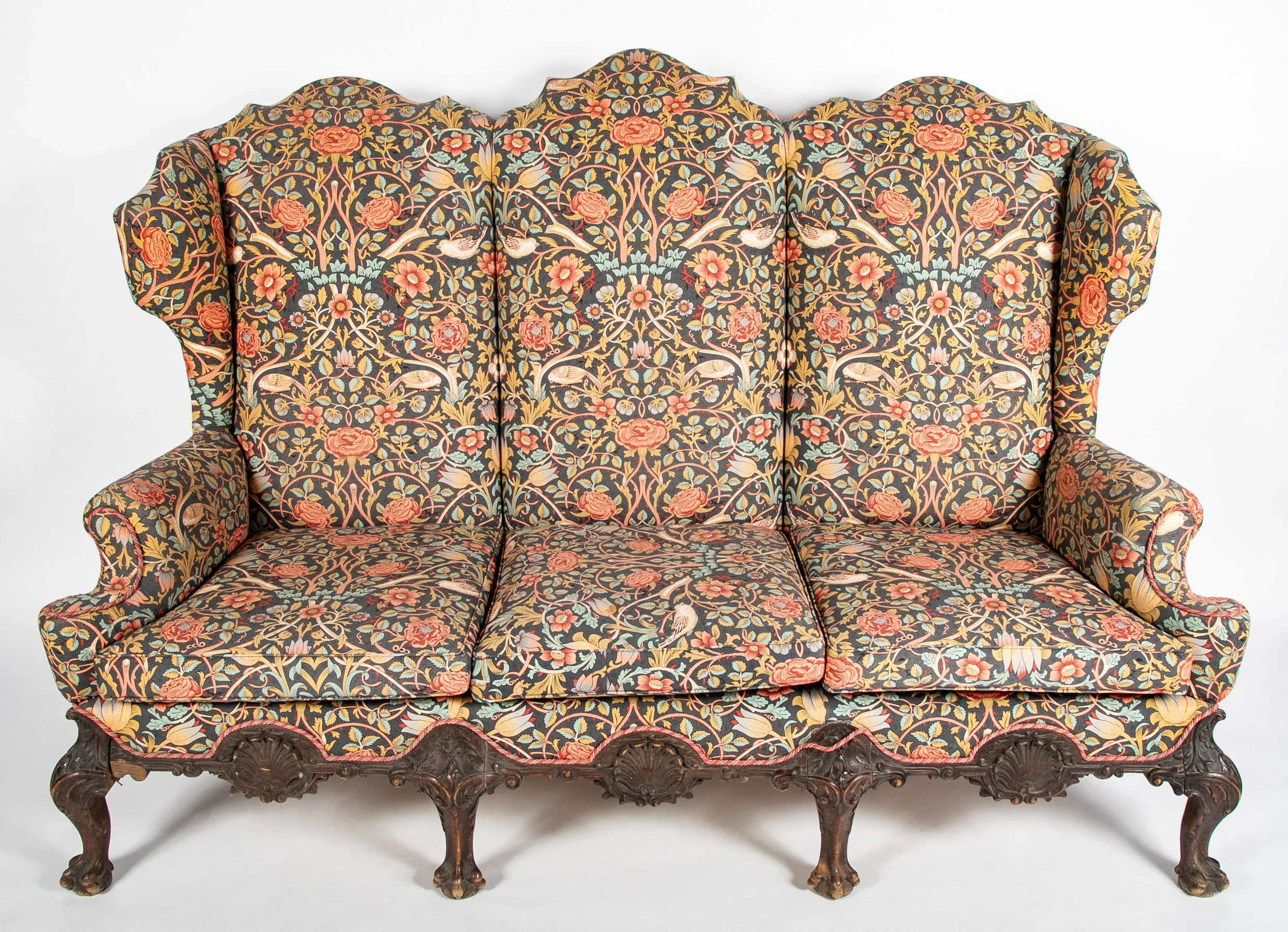 Grand British Sofa from Wales Country Estate having intricate carved details.  Circa 1870.  

60" h x 86" w x 34" d