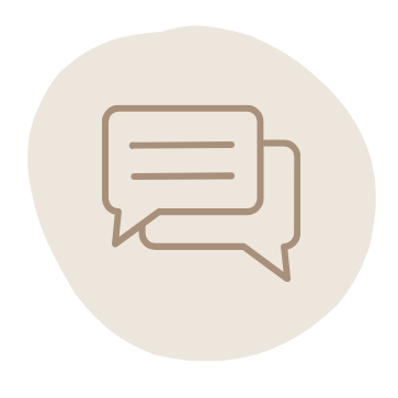 Icon of two overlapping speech bubbles, one with lines representing text, on a light circular background.