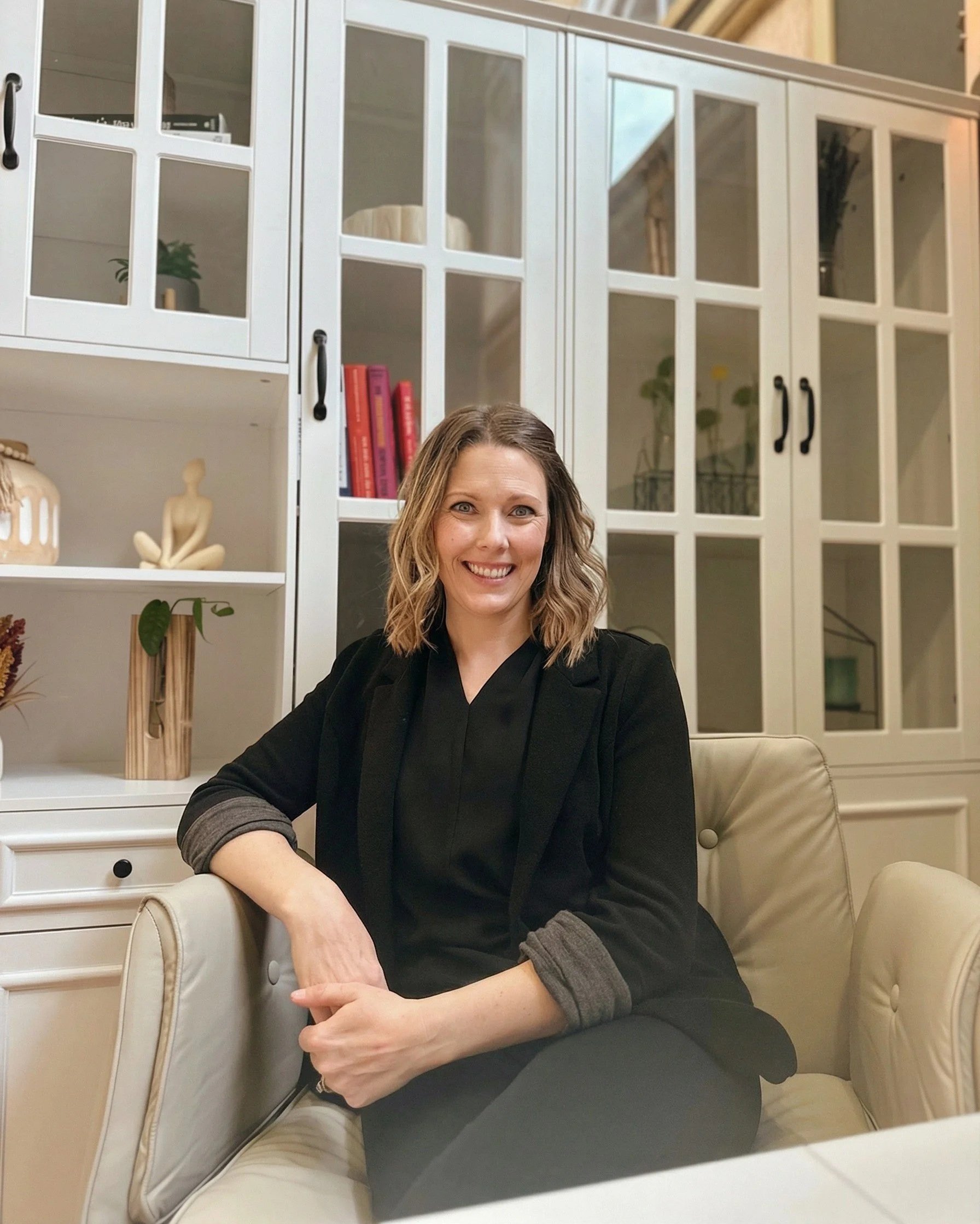 Carla Walter, PA-C, founder of TideShift Health, seated in her Bremerton direct primary care office.