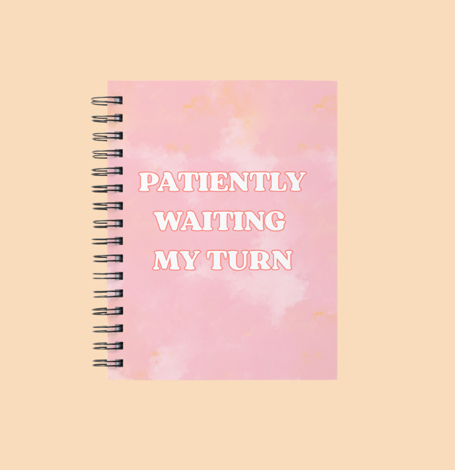 Pink and yellow journal for Fertility Awareness