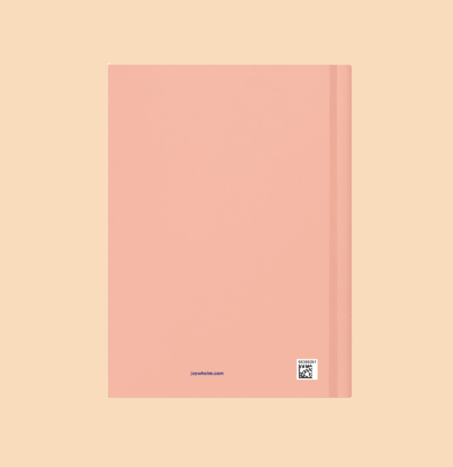 Back of pink journal with joywhelm.com on the bottom