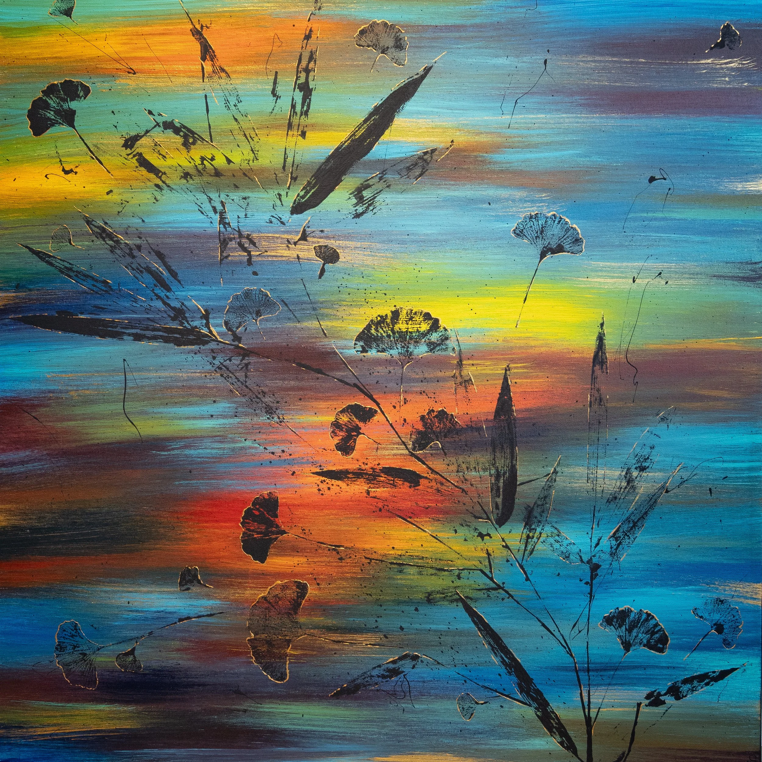 Abstract colorful background with black floral silhouettes, resembling a sunset or sunrise over water.
