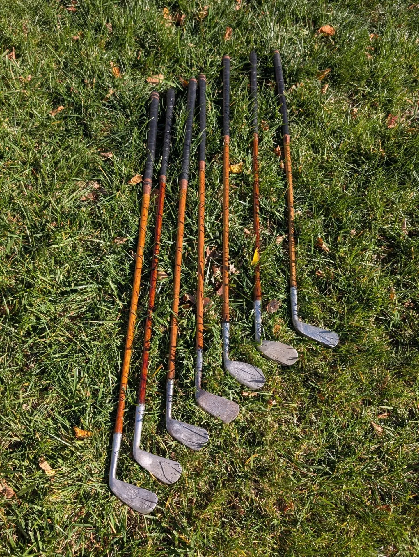 Fresh out of the workshop. A more traditional gripped and whipped commissioned set of all Scotland made clubs. 

Tom Stewart driving iron, mid iron, mashie iron, niblick, and putter. 

Hendry and Bishop Edinburgh deep face mashie

Charles Gibson mash