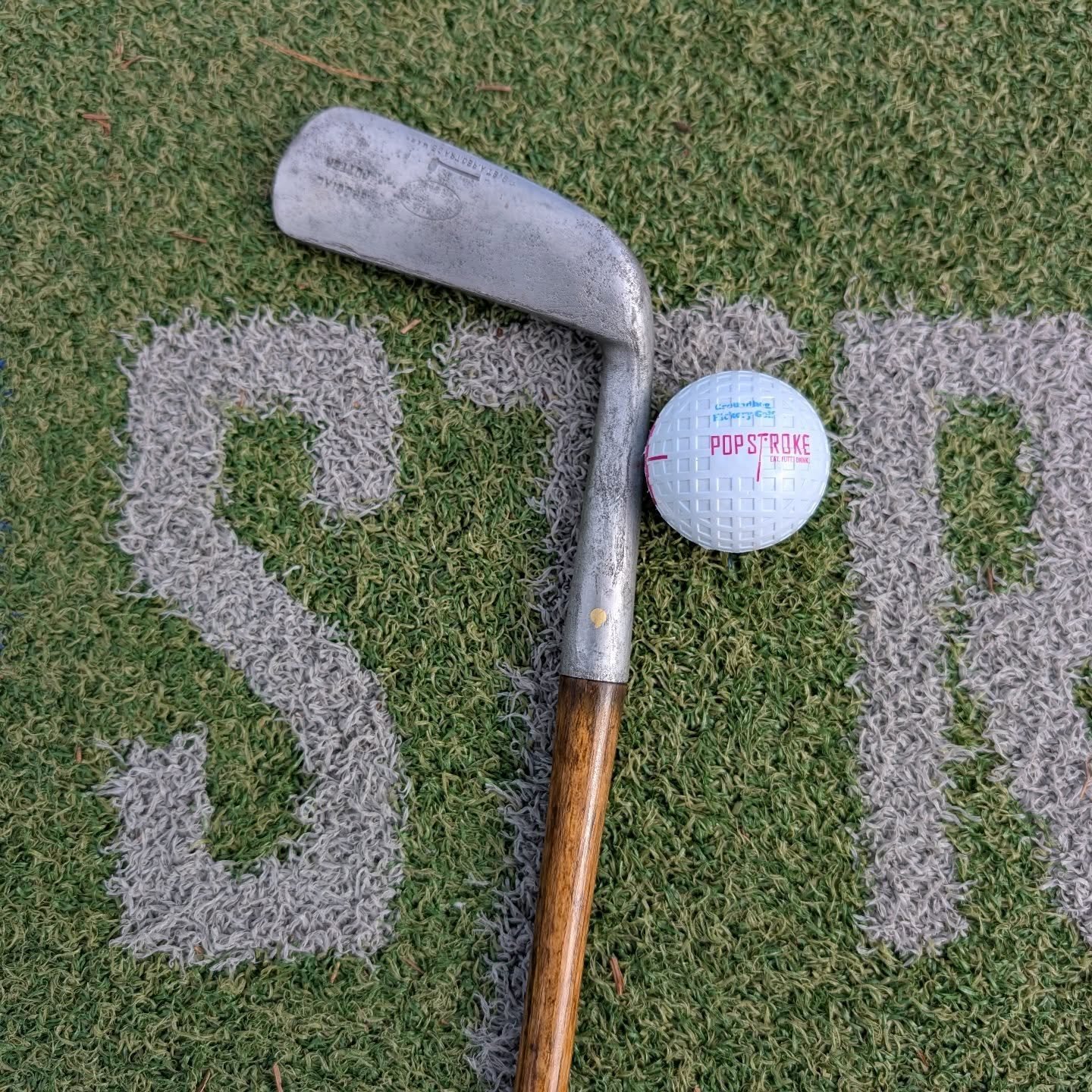 Old meets new. A Tom Stewart hickory and a waffle ball on modern state of the art mini golf. 

#popstroke
#playhickorygolf