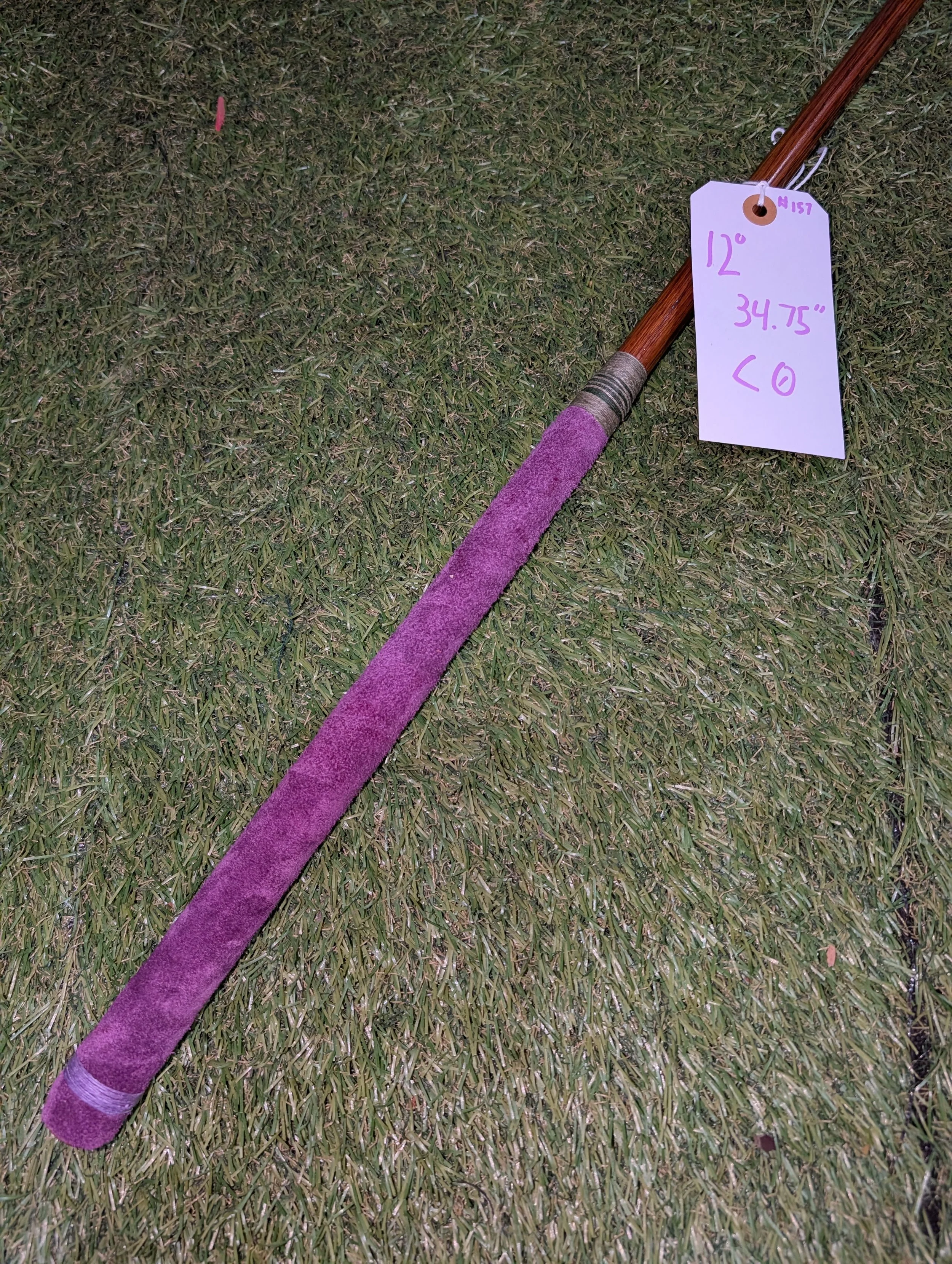 Hickory golf club putter in the colors of Scottish thistle