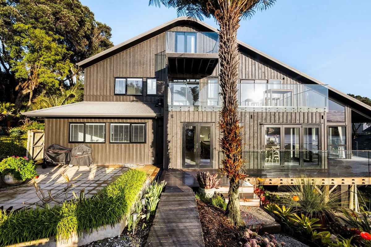 Hibiscus Coast extension with multiple timber decks rebuilt across four levels of the home