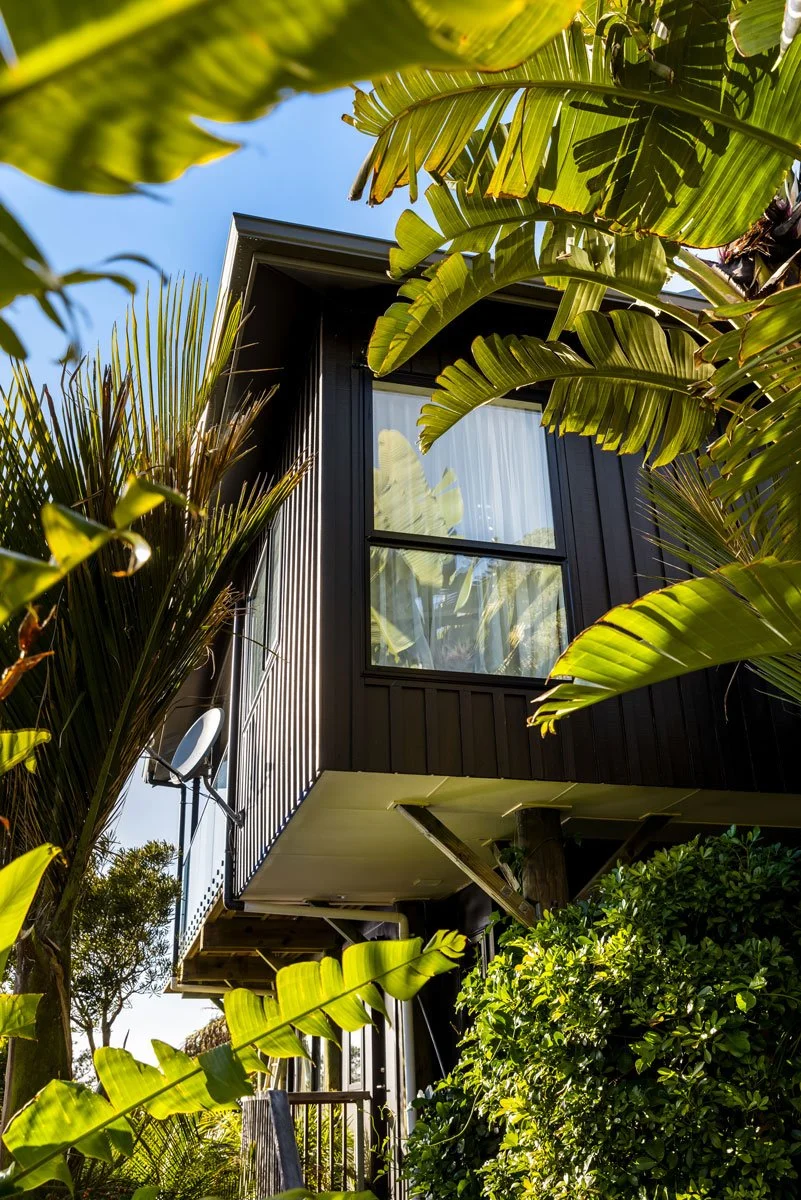 Architectural extension on Auckland’s Hibiscus Coast with steel framing and new joinery