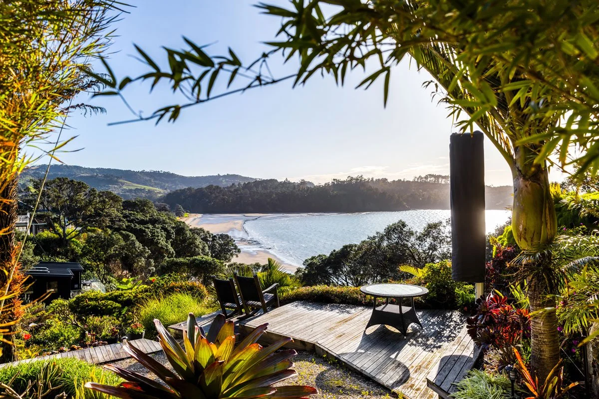 Timber decking upgrade using kanda hardwood, overlooking native bush and ocean views