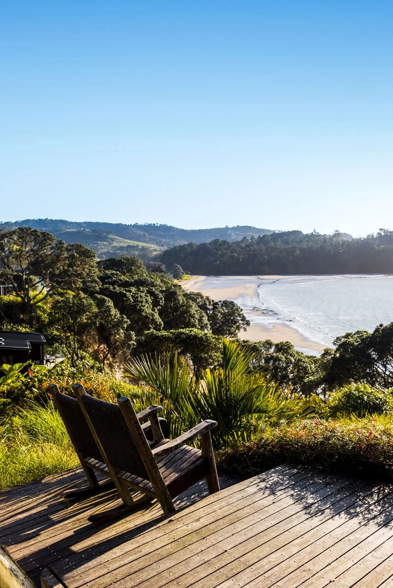 Coastal renovation of kitchen and dining area with new cladding, steel structure, and joinery