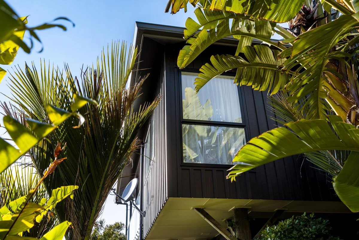 Renovated dining zone with natural light, crisp detailing and seamless flow to outdoor entertaining space.