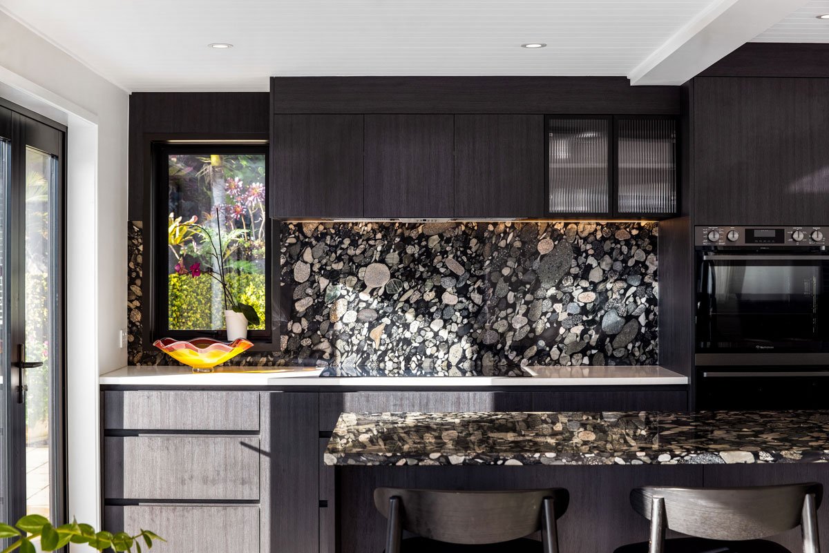 Close-up of terrazzo backsplash and modern cabinetry from kitchen renovation in Auckland