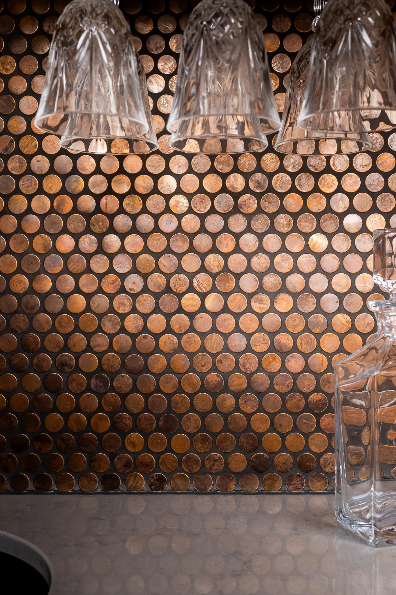 Interior corridor framed by vertical shiplap walls and skylight above for soft, natural daylight.