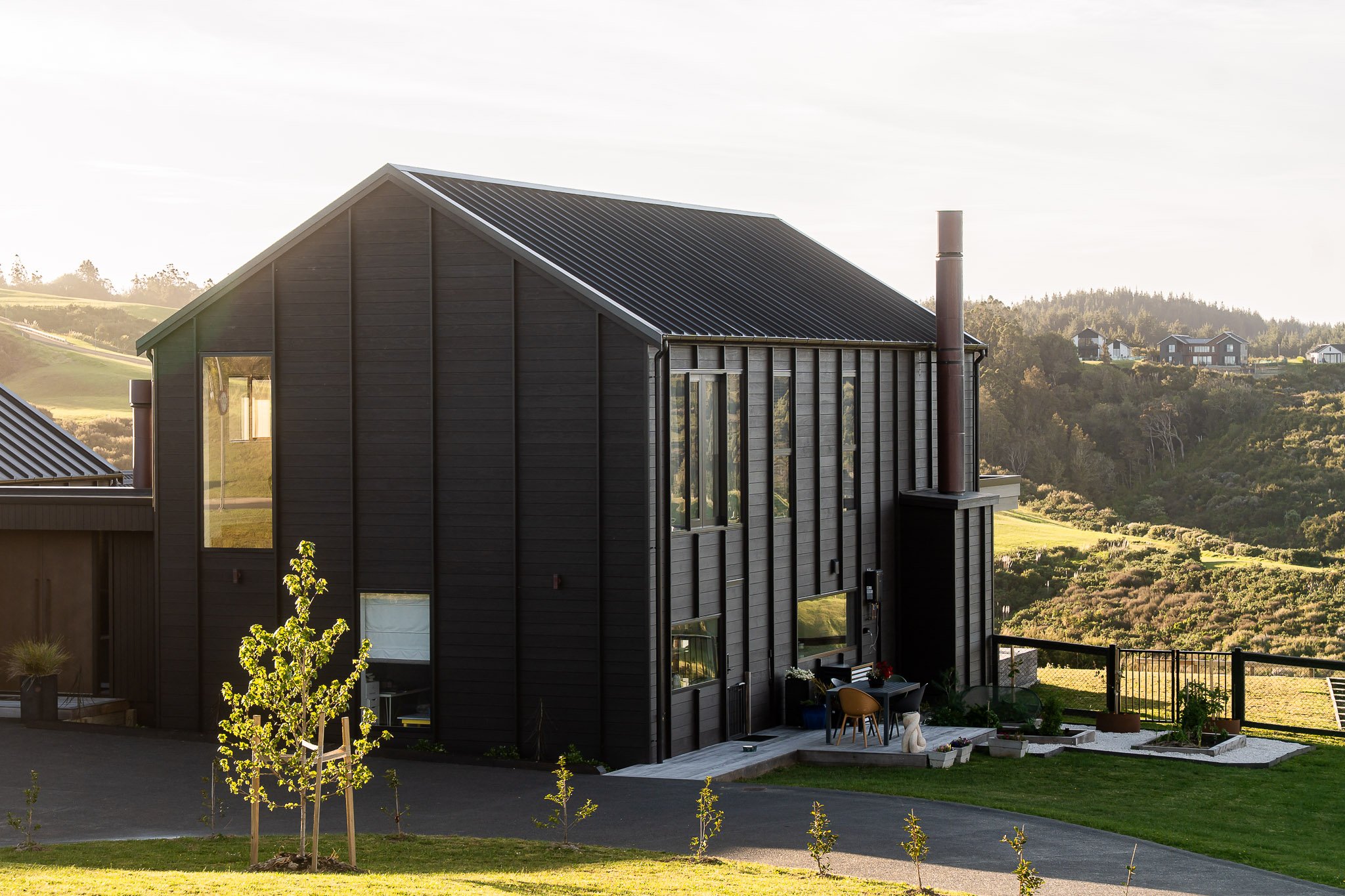 Luxurious and light-filled, this Weiti Bay seamlessly integrates north-facing home for elevated living.