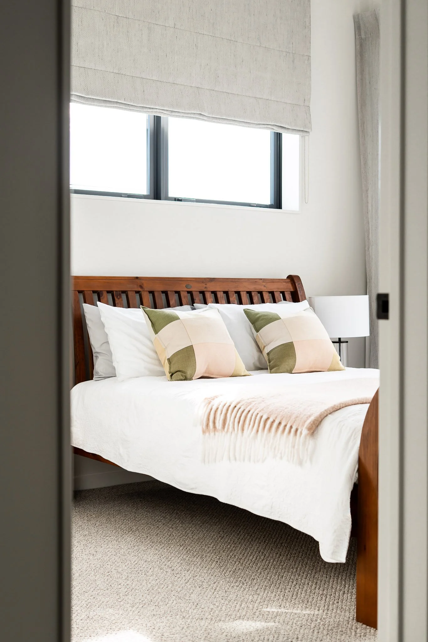 Master walk-in robe featuring full joinery fit-out and underlit shelving for luxury storage.