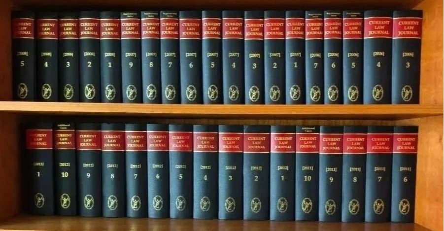 A shelf filled with volumes of the 'Current Law Journal' arranged in numerical order, with the first row containing volumes 1 through 15, and the second row containing volumes 16 through 31.