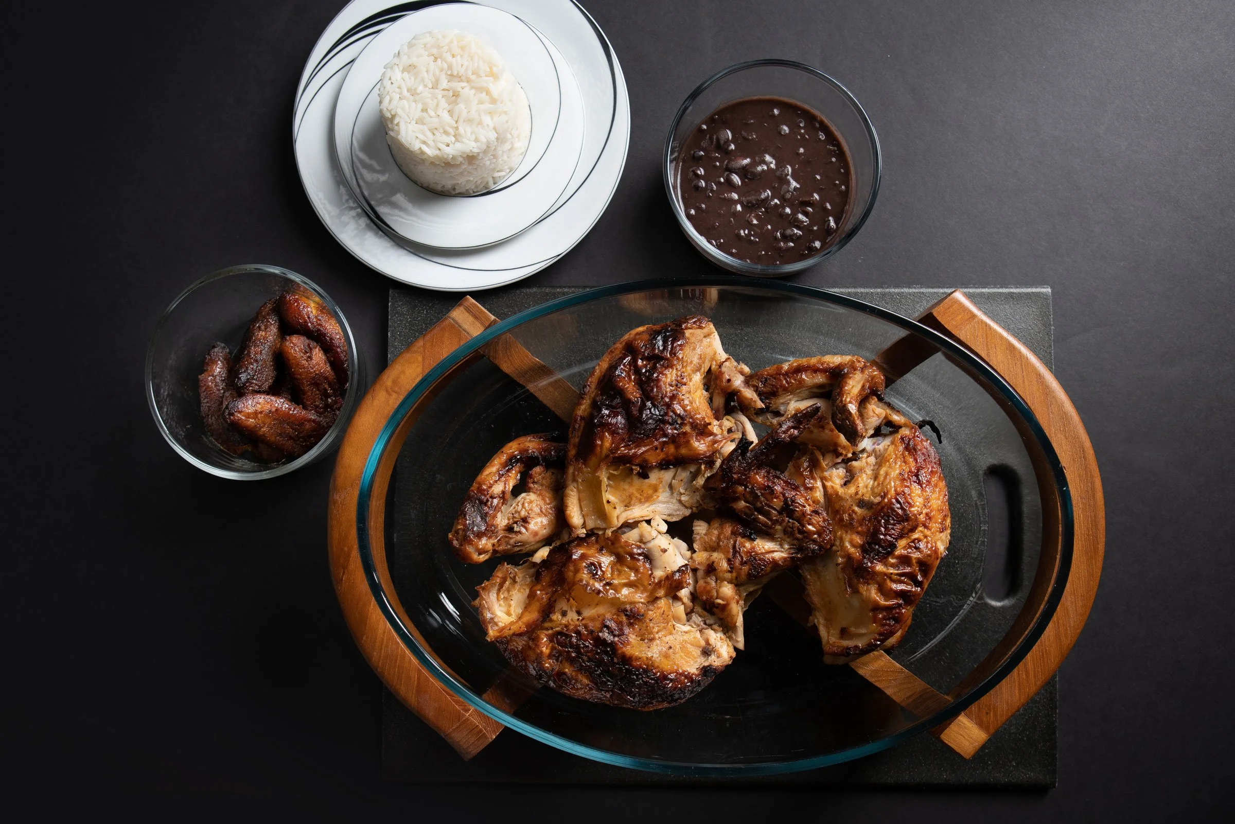 MJK_Grilled-Chicken-Fried-White-Rice-Black-Beans-Plantains_Aerial-View_web.jpg