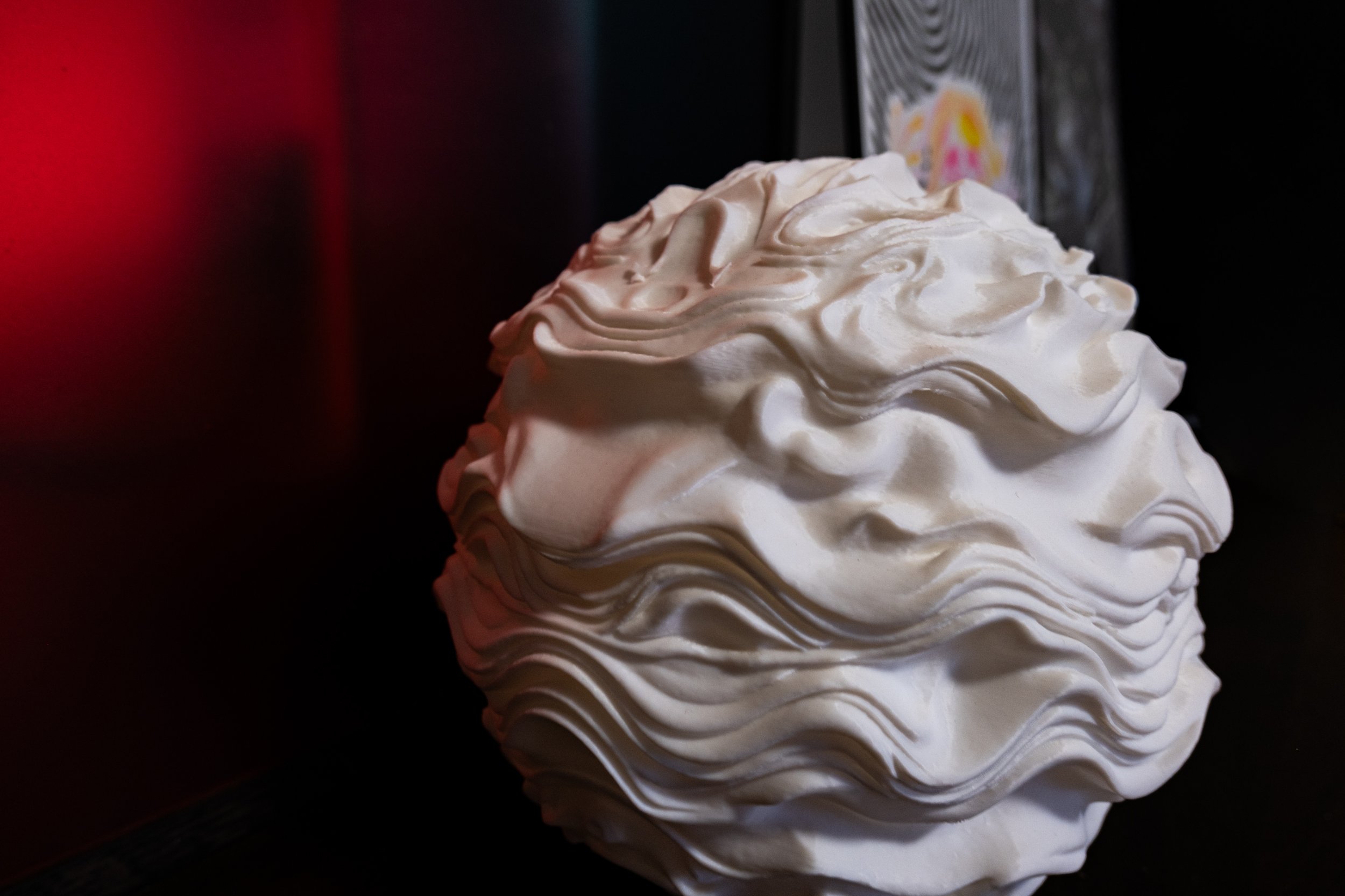 Detail of the Syzygy lamp surface and form, highlighting restrained design and proportion.