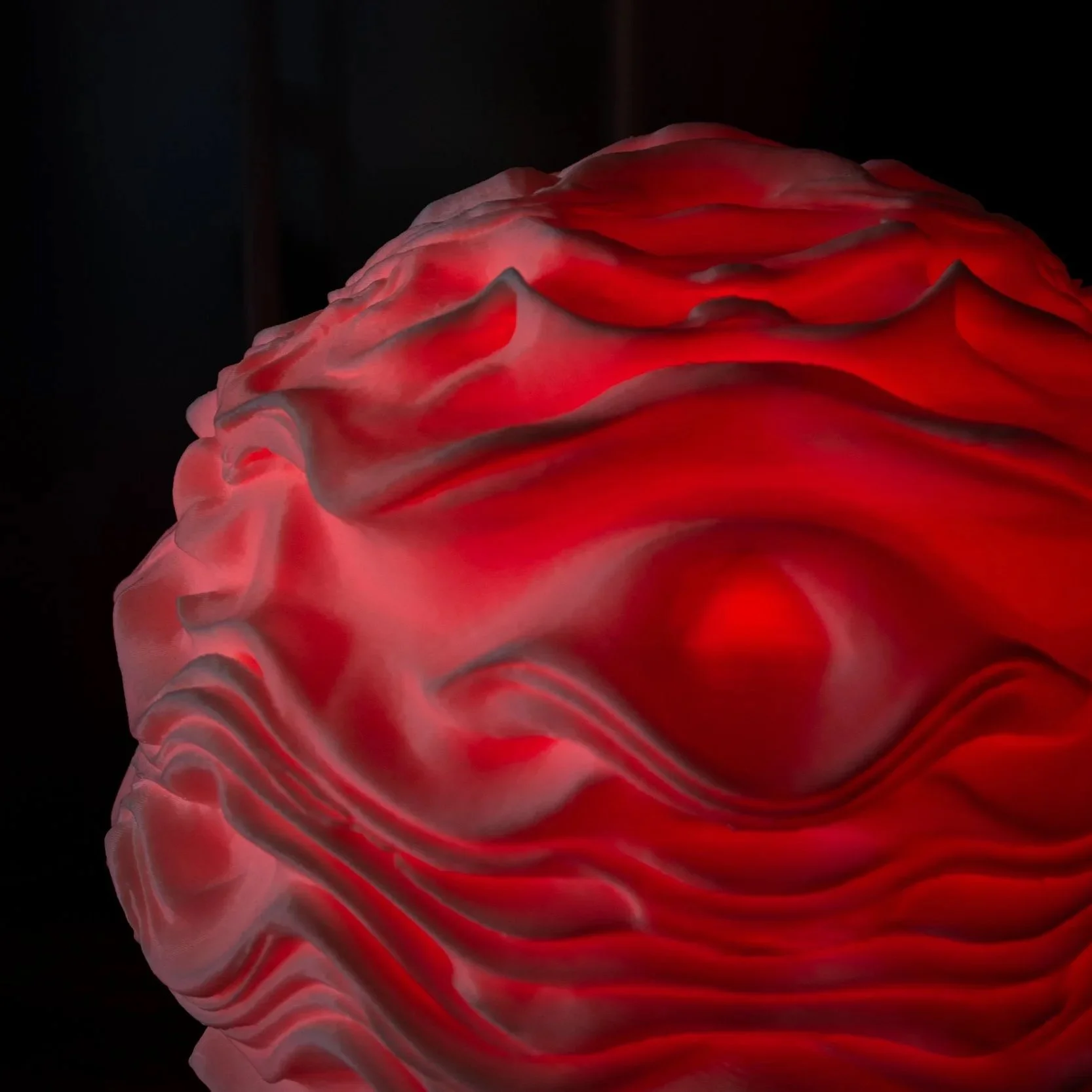 Close-up of diffused light from the Syzygy lamp, designed to shape atmosphere rather than brightness.