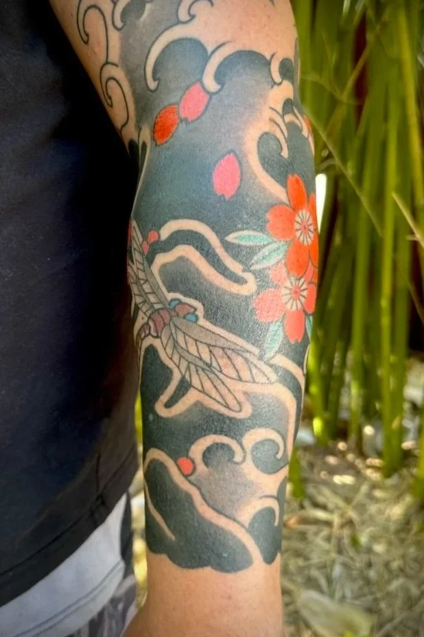 japanese tattoo dragonfly and cherry blossoms