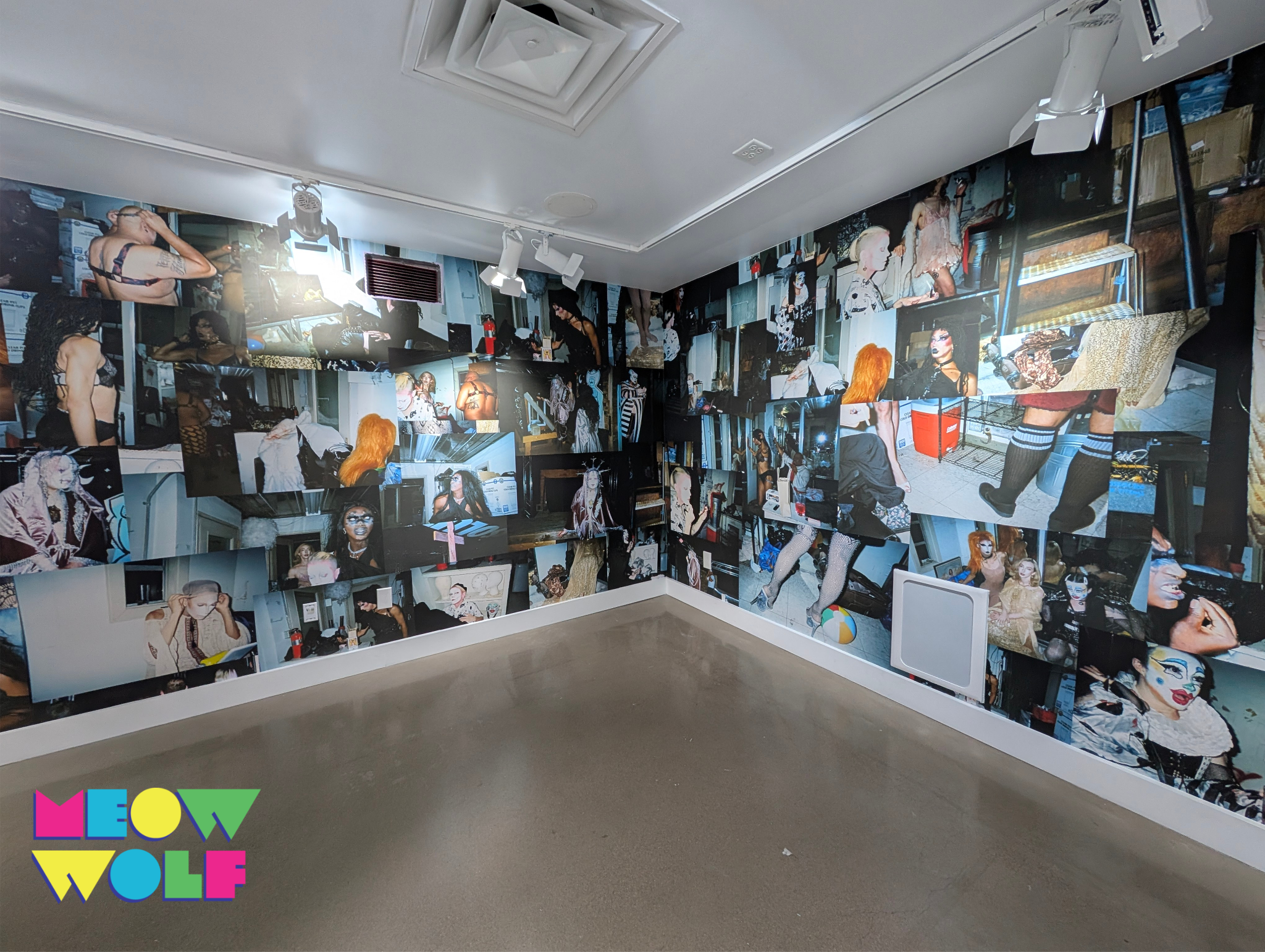 A gallery wall covered with numerous printed photographs of people in various costumes and settings, with the logo 'Meow Wolf' in colorful letters at the bottom left corner.
