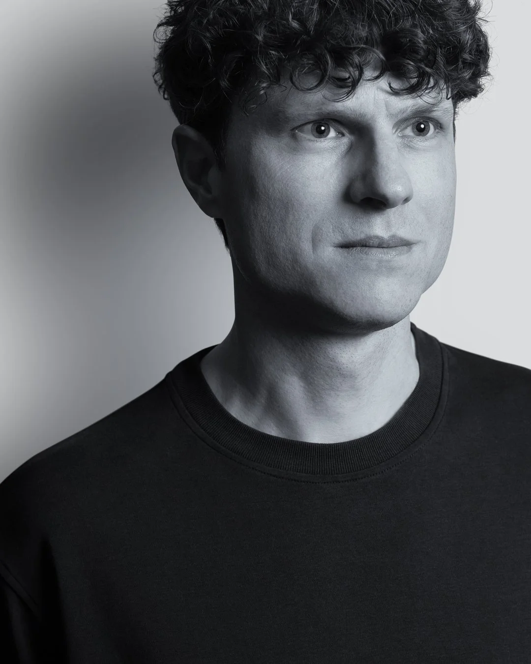 David Schweinfurth. Portrait in black and white.