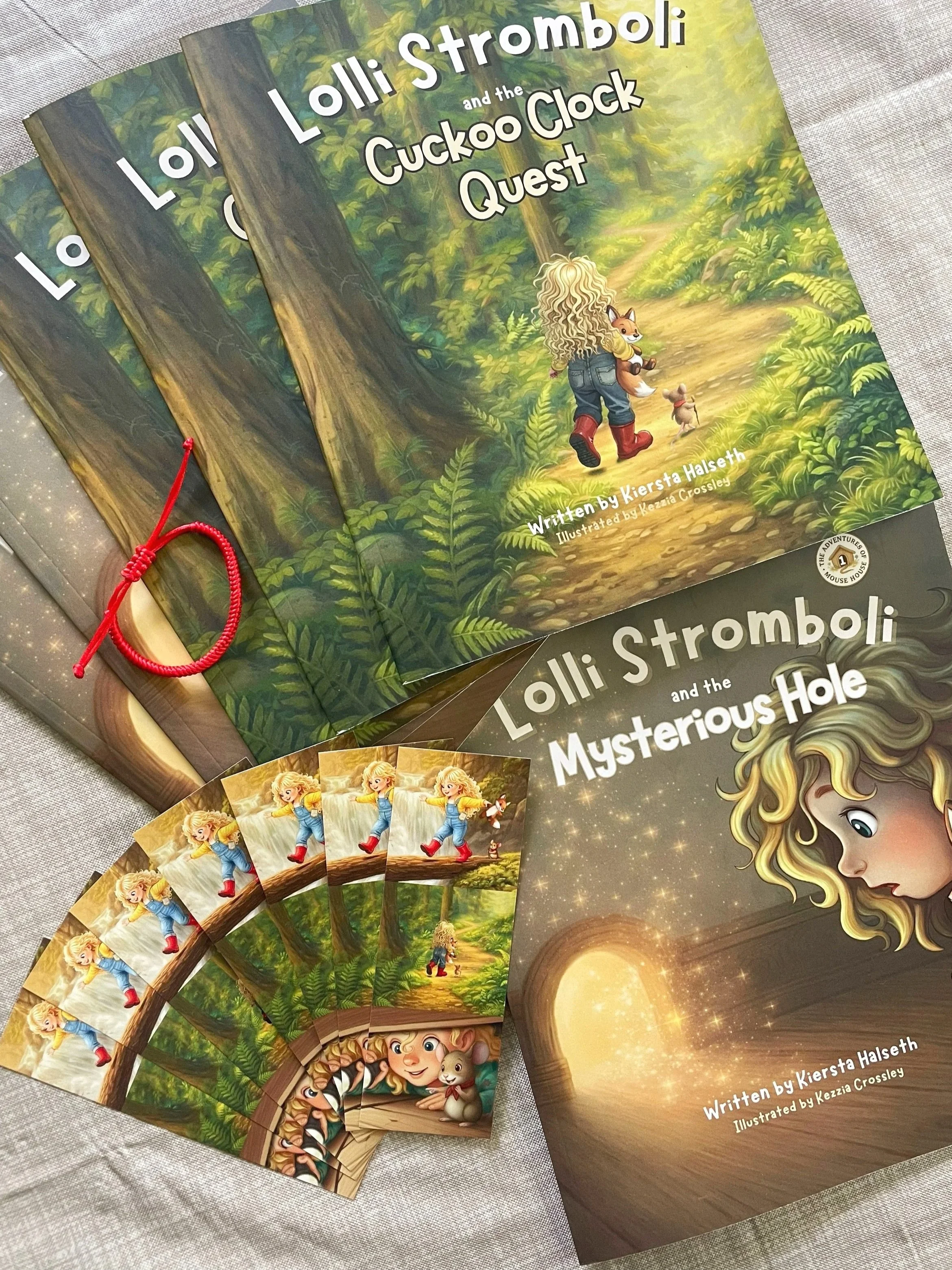 Lolli Stromboli children's books, bookmarks, and a friendship bracelet displayed as a thoughtful bedtime reading gift set.