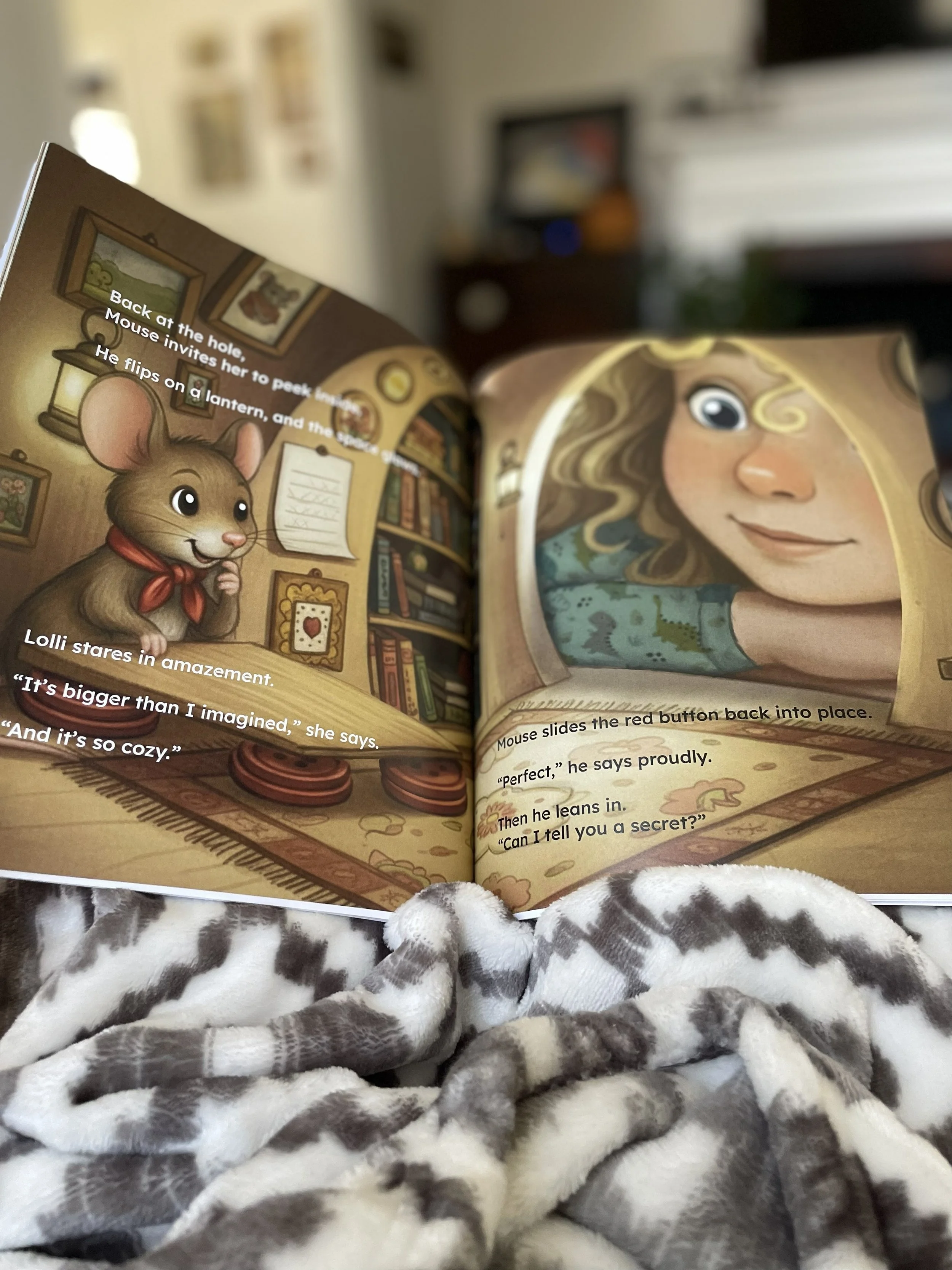 Children's bedtime picture book open to a Mouse House illustration in the Lolli Stromboli series.