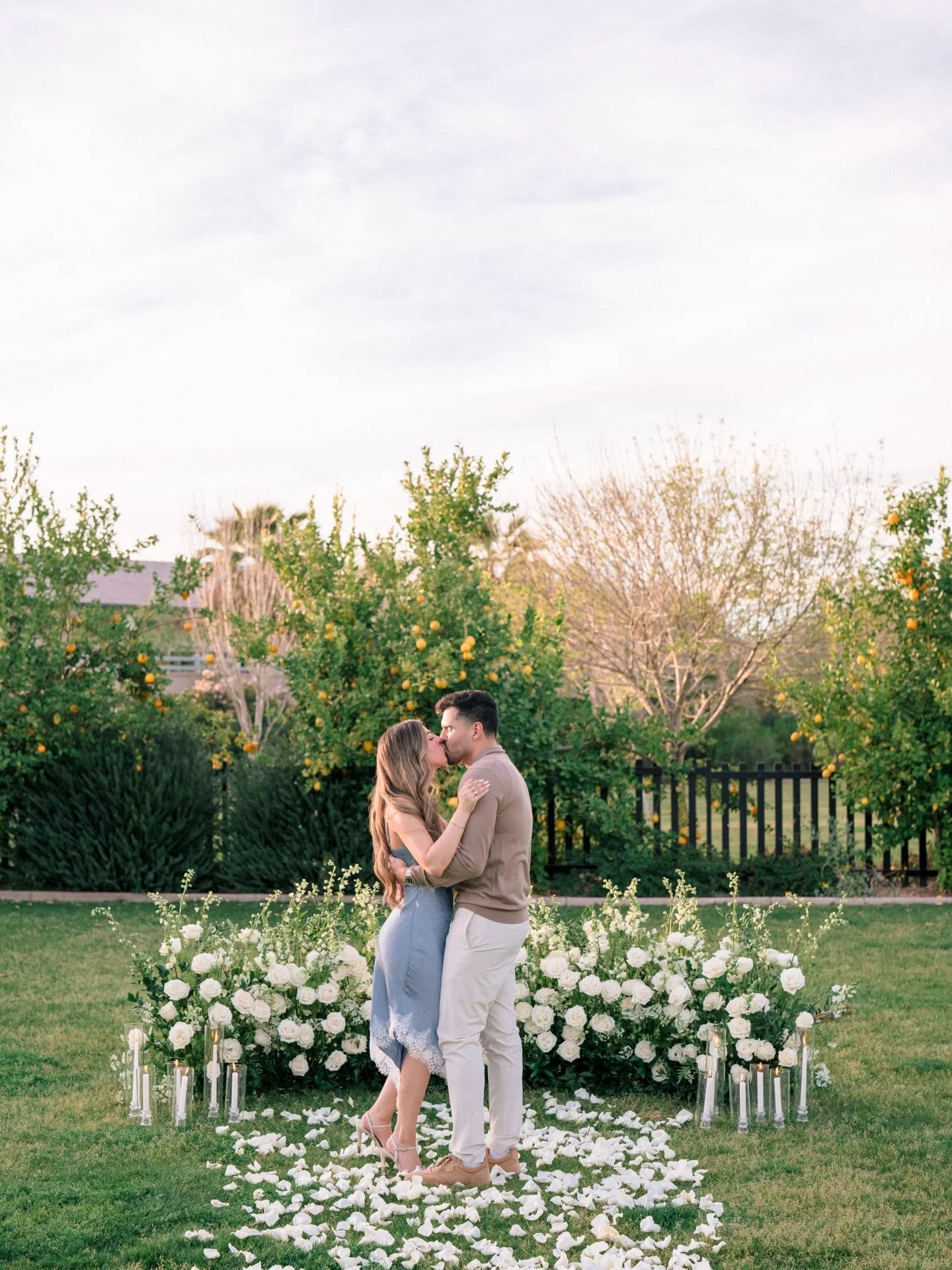 Alexa and Raul&rsquo;s proposal session was nothing short of magical. Seriously, from the slight overcast, to the golden sunset glow, and the floral design! Raul picked the perfect location for the proposal, a small lemon garden located within their 