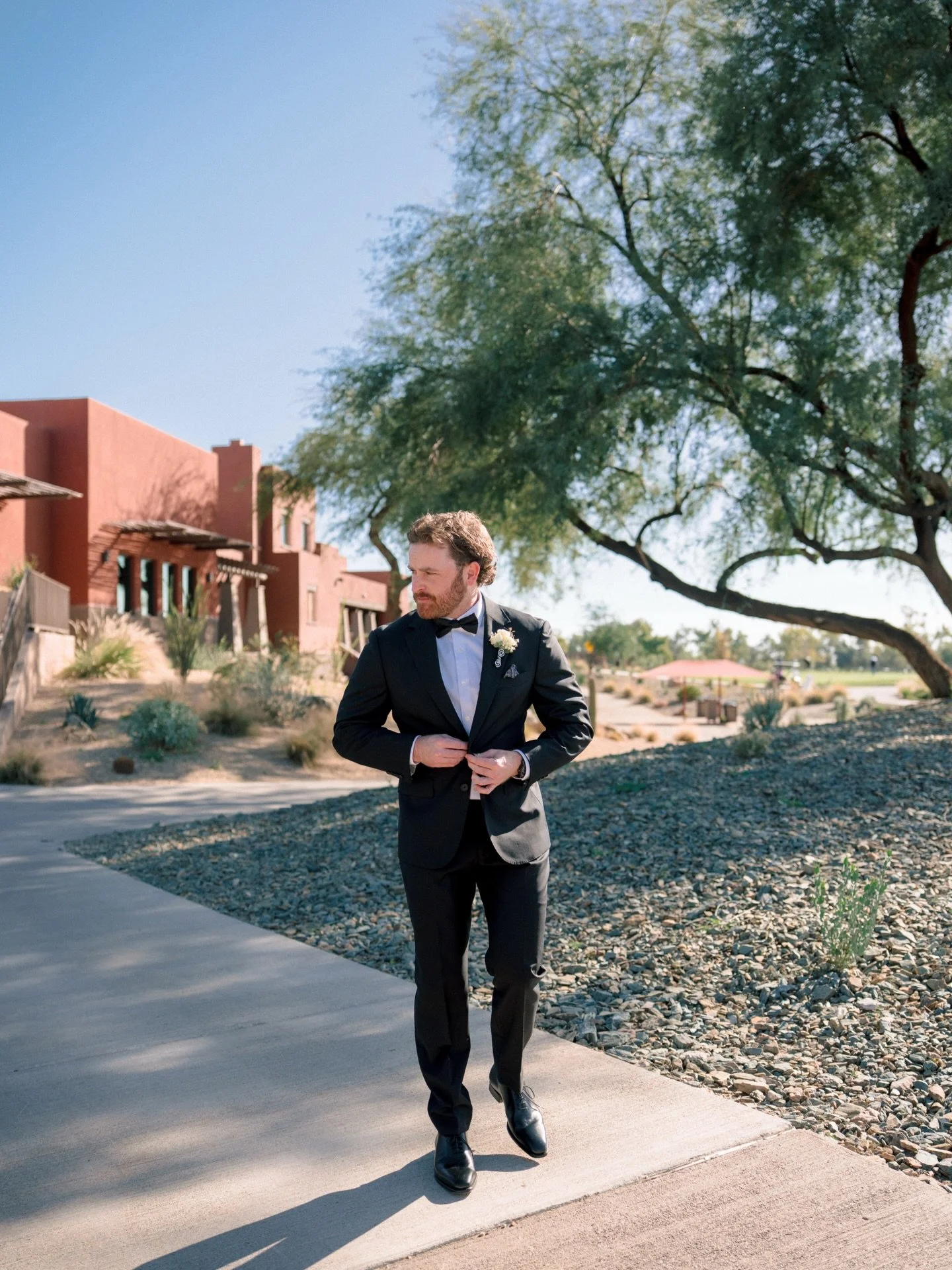 Nobody talks about the groom&rsquo;s morning.

The quiet of getting dressed. The moment he buttons his jacket for the last time as just himself. The details he chose because they meant something. The monogrammed cuffs, the boutonniere, the pocket squ