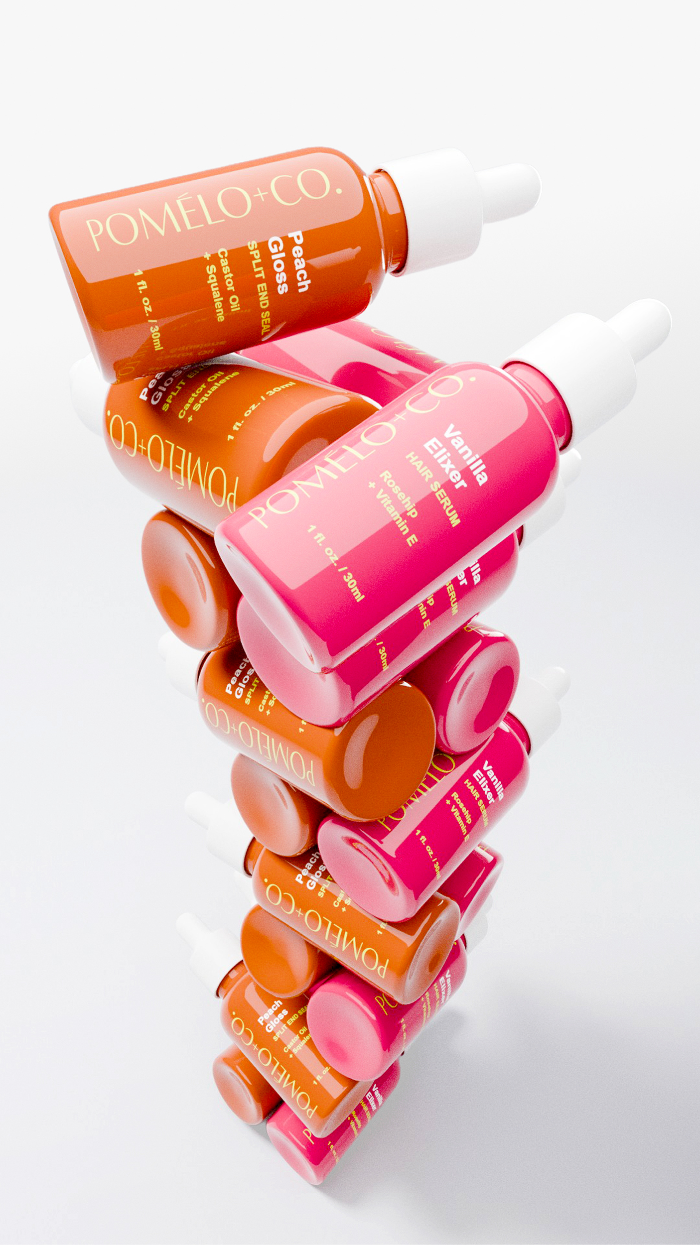 Stack of Pomelo + Co. Peach Gloss and Vanilla Elixir Hair Serum bottles with pink and orange labels, placed on a reflective white surface.