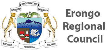 The emblem of the Regional Council with lions holding it, featuring a mountain, water, ship, and ships wheel symbols, and words like 'cooperation,' 'integrity,' 'industry,' and 'Erongo.'