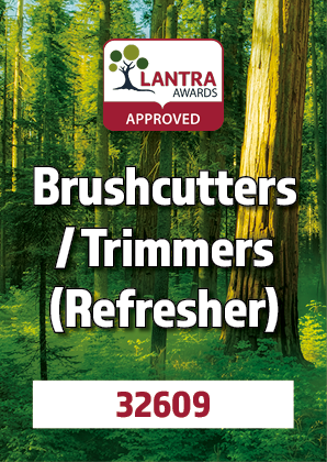 Sign indicating approved brushcutters and trimmers refresher course with a forest background and green trees.