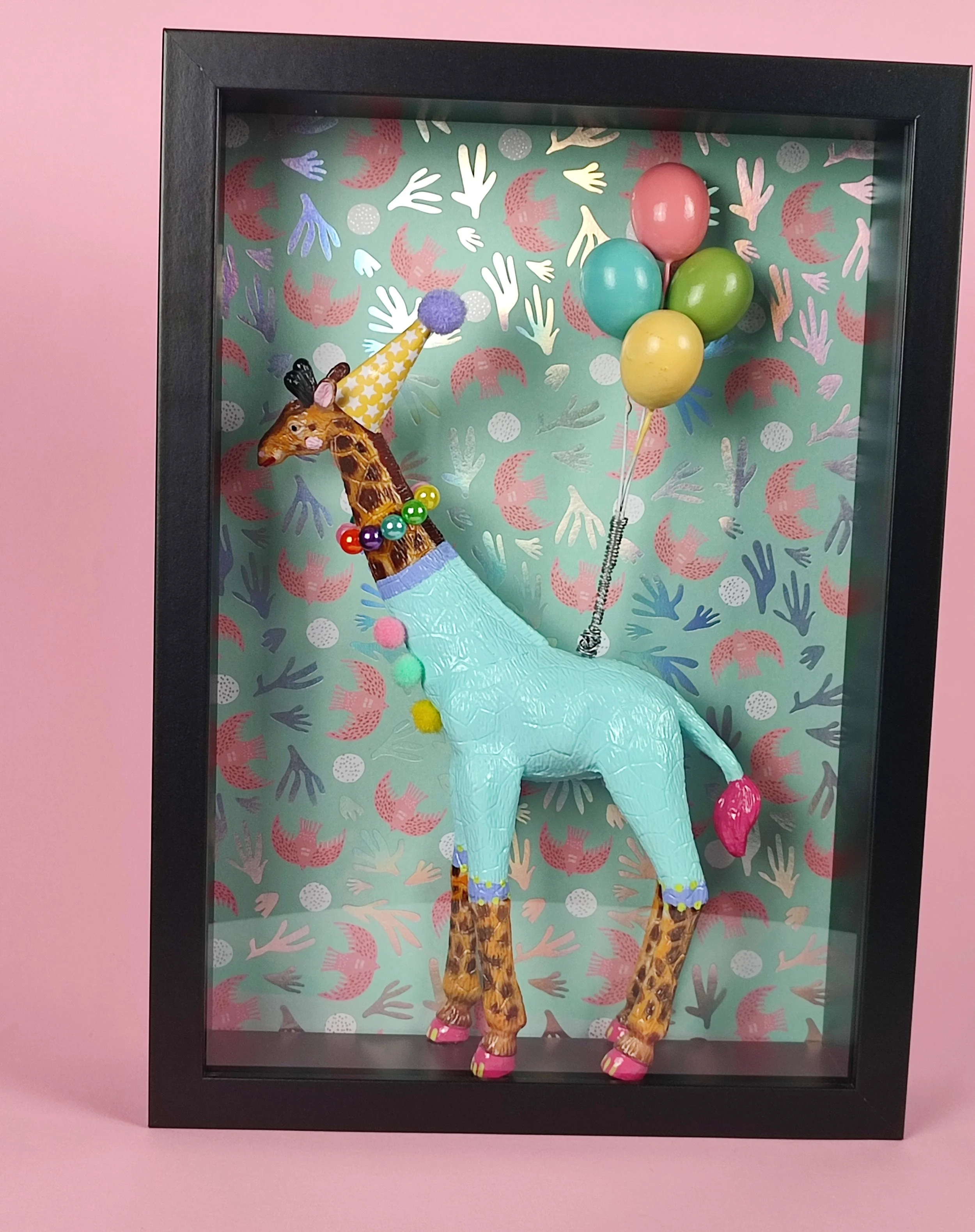 Giraffe im schwarzem Rahmen