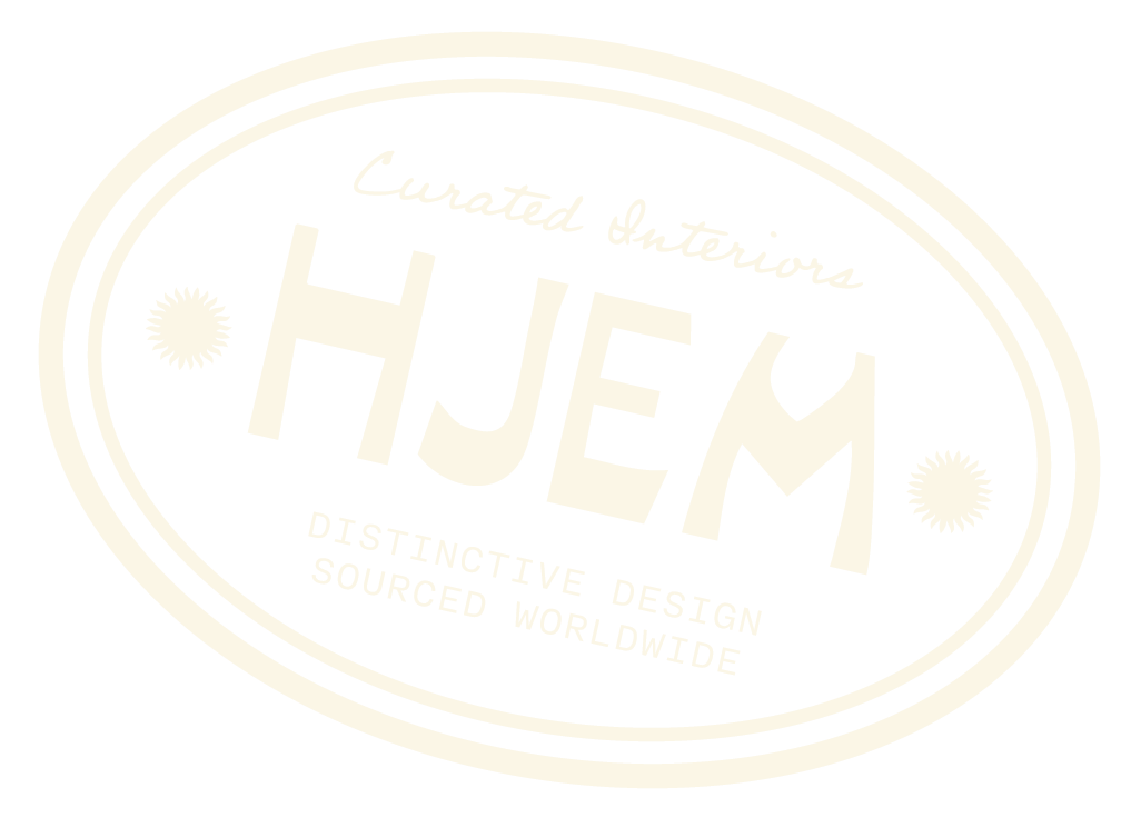 Label for HJEM interior curated design with decorative elements and text 'Distictive Design Sourced Worldwide' on a black background.