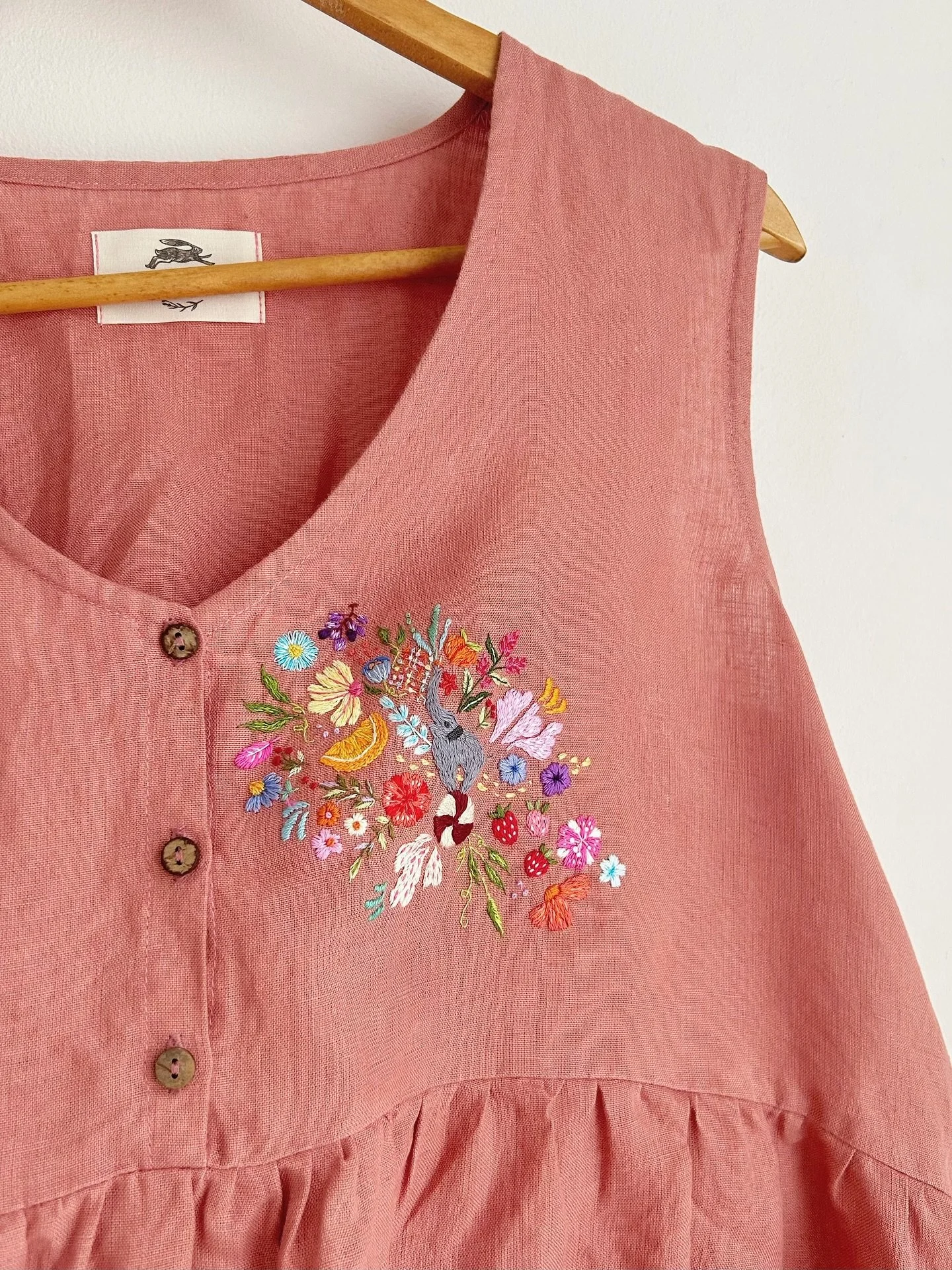 Adding a touch of stitches to complement the beautiful elephant already on this dress 🐘✨

This little star stands on it&rsquo;s ball 🏐, puffing out blossoms and fruity punch wherever she goes 🌸🍓🍊💨 Say hello to Ellie the Flower Farter 🐘✨
(named
