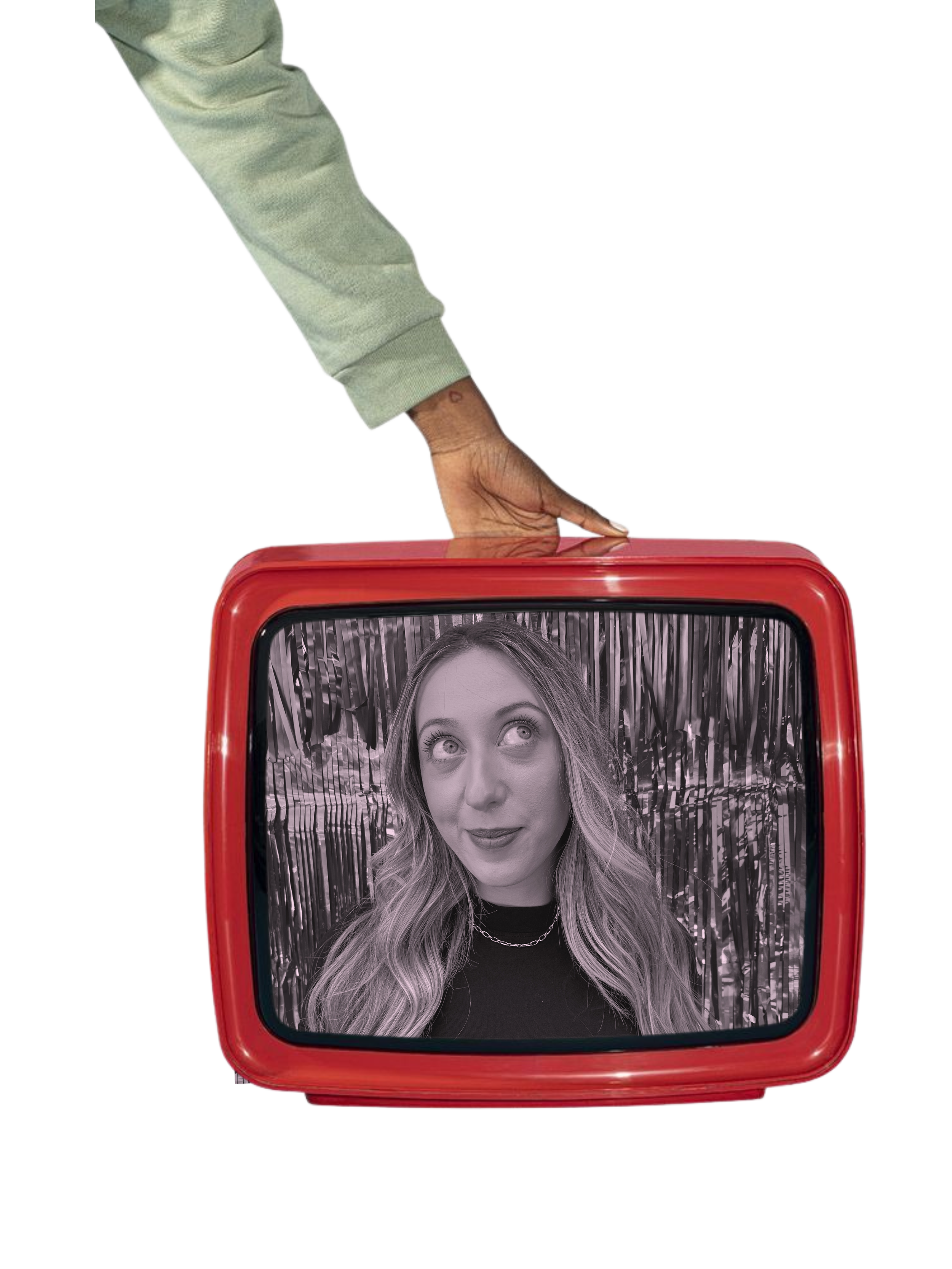 A person with a green sleeve is holding a red vintage television with a black and white image of a woman with long wavy hair on the screen, against a reflective metallic background.