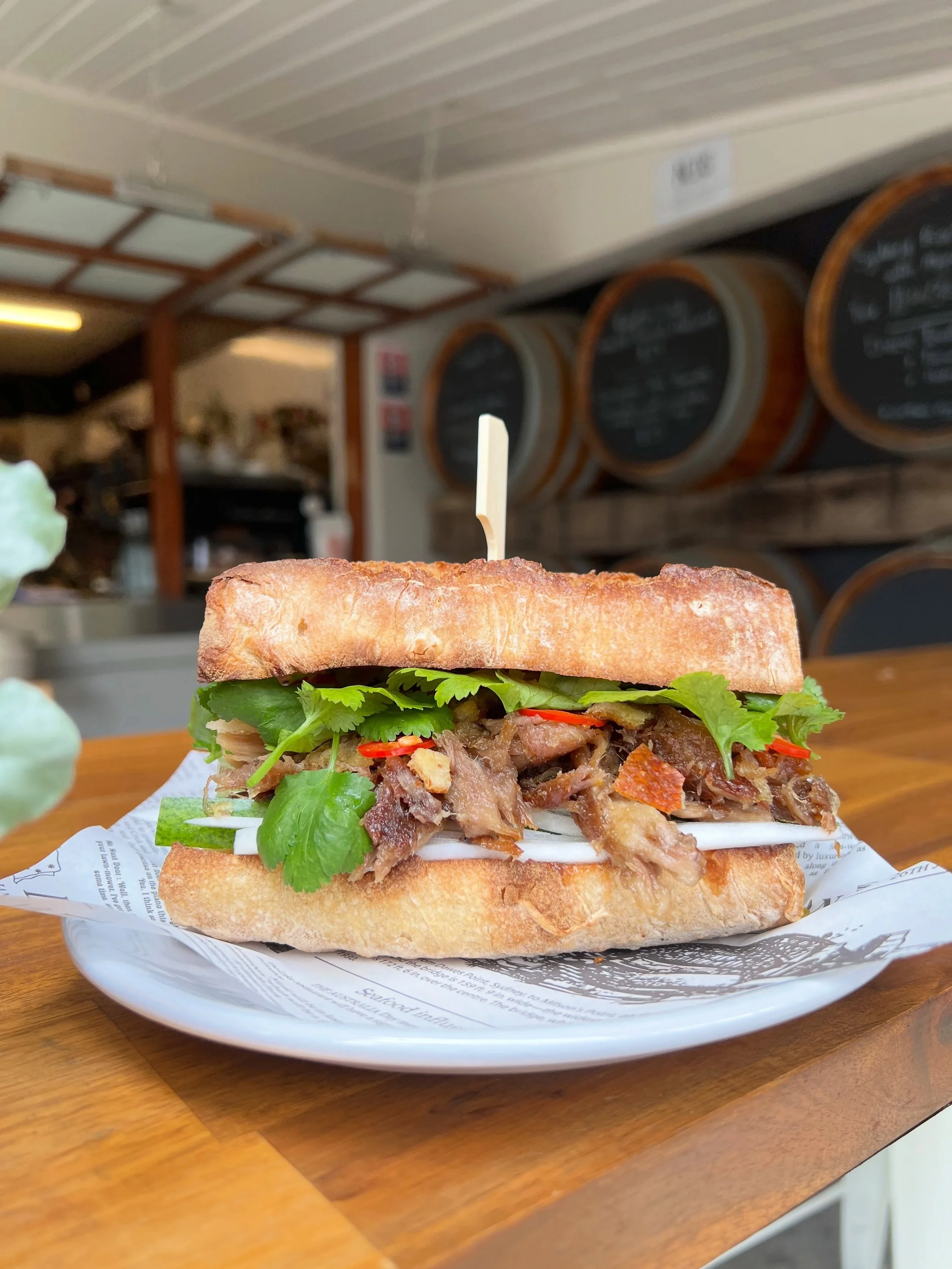 On the specials board for a good time, not a long time!

Lemongrass pork, cucumber, chilli, coriander, pickled radish and mayo on a sourdough baguette. 

Send this to someone who owes you lunch ;)