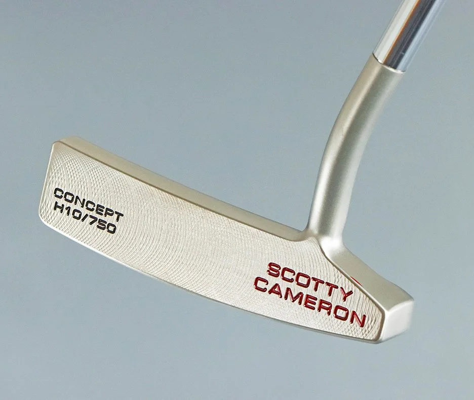 A golf putter with the brand name 'Scotty Cameron' and model 'Concept H01/50' written on it.