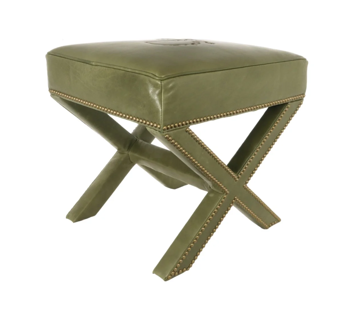 Green leather upholstered stool with brass nailhead trim and crossed wooden legs.