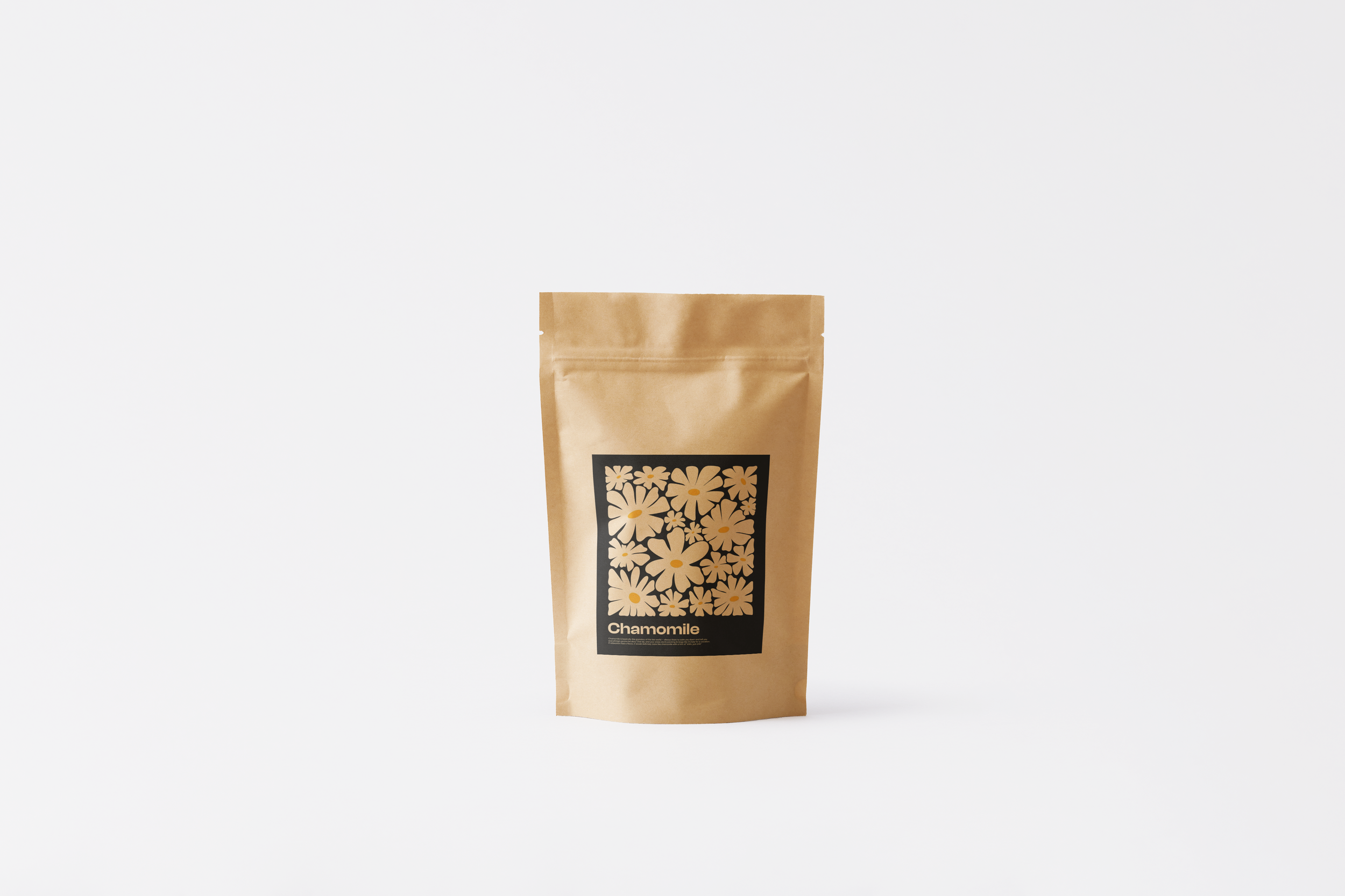 Brown paper package with a black label featuring white daisies and the word 'Chamomile' at the bottom center.