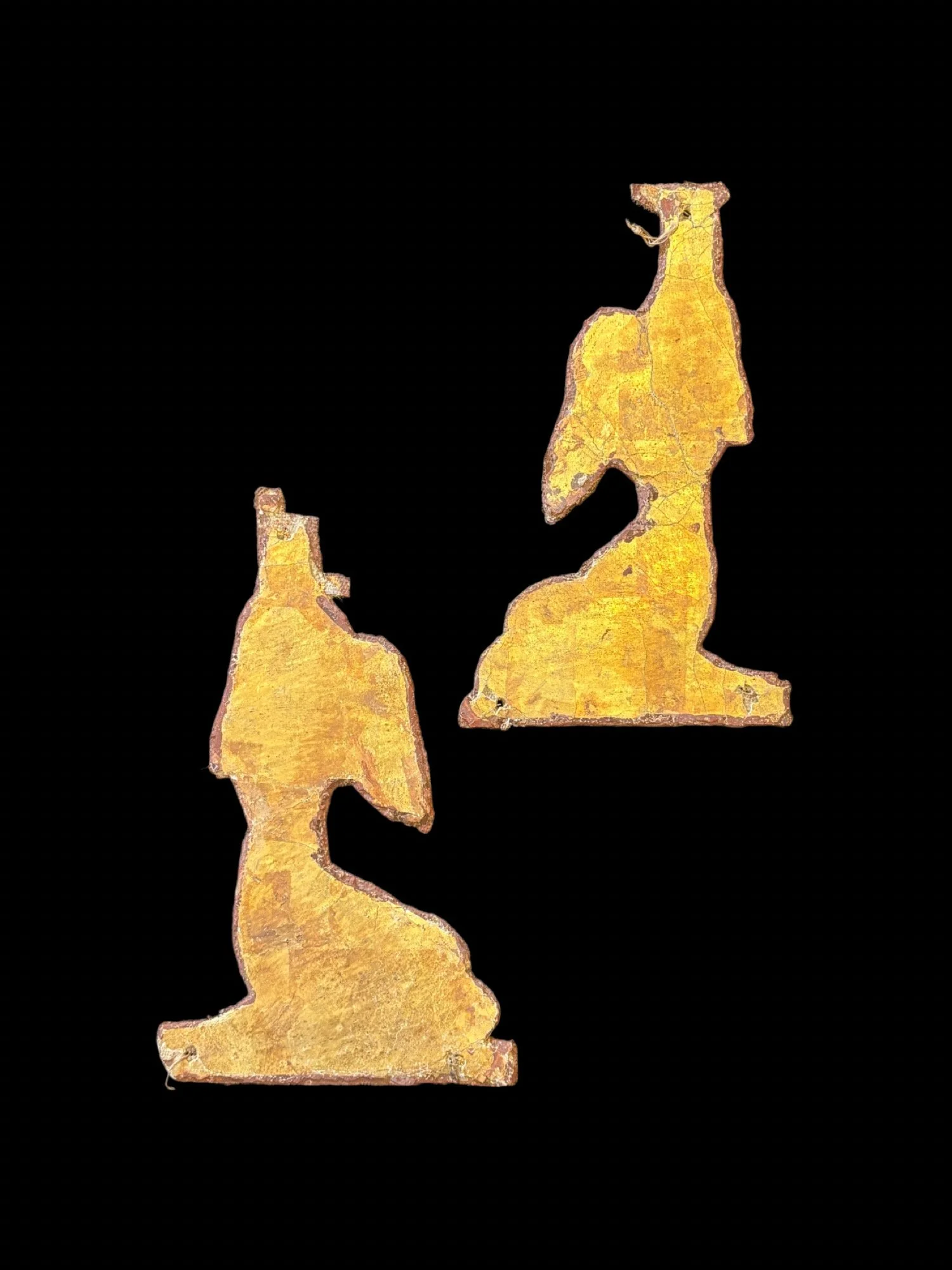 A pair of Egyptian gilt cartonnage goddesses