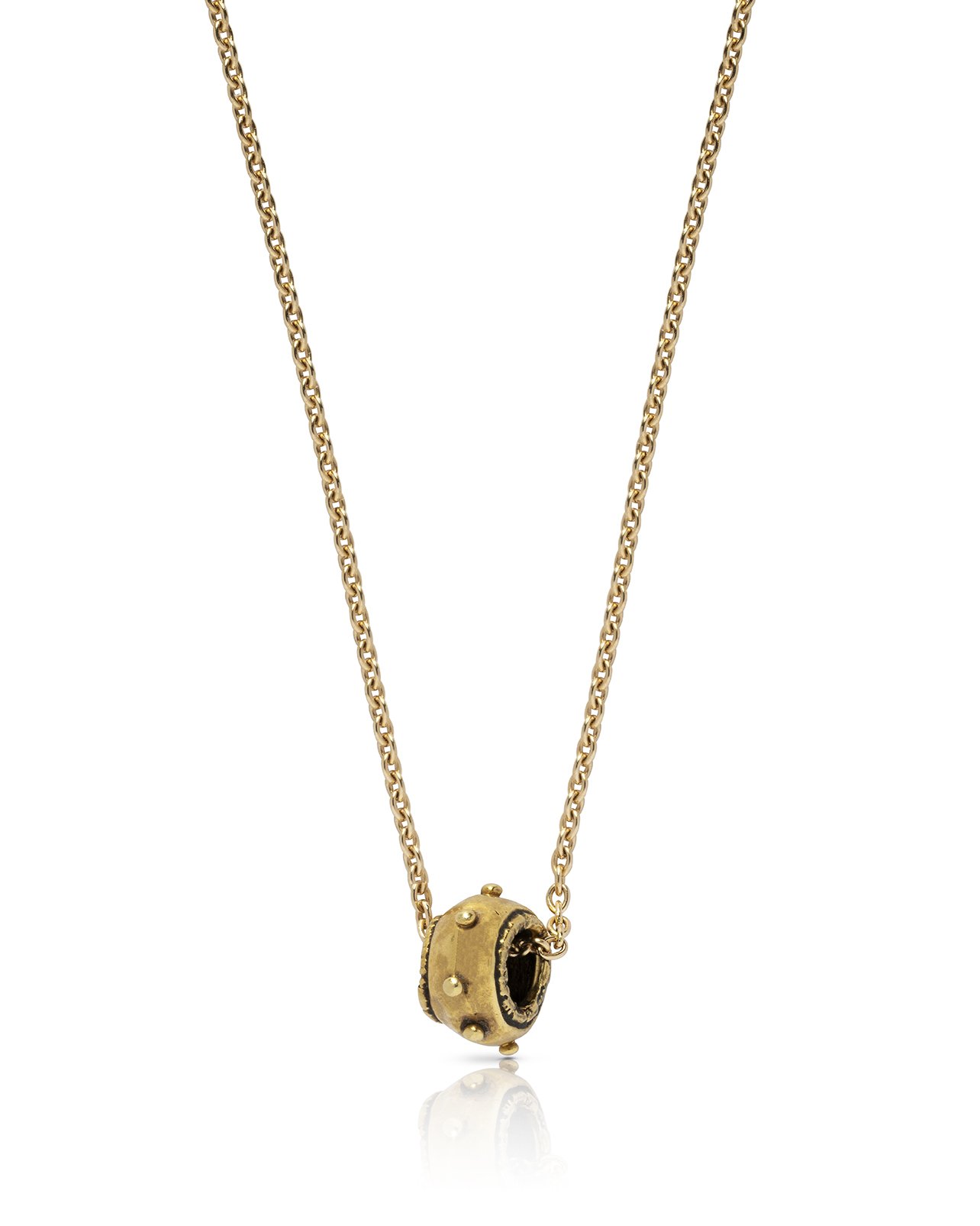 A Western Asiatic gold bead set as a pendant