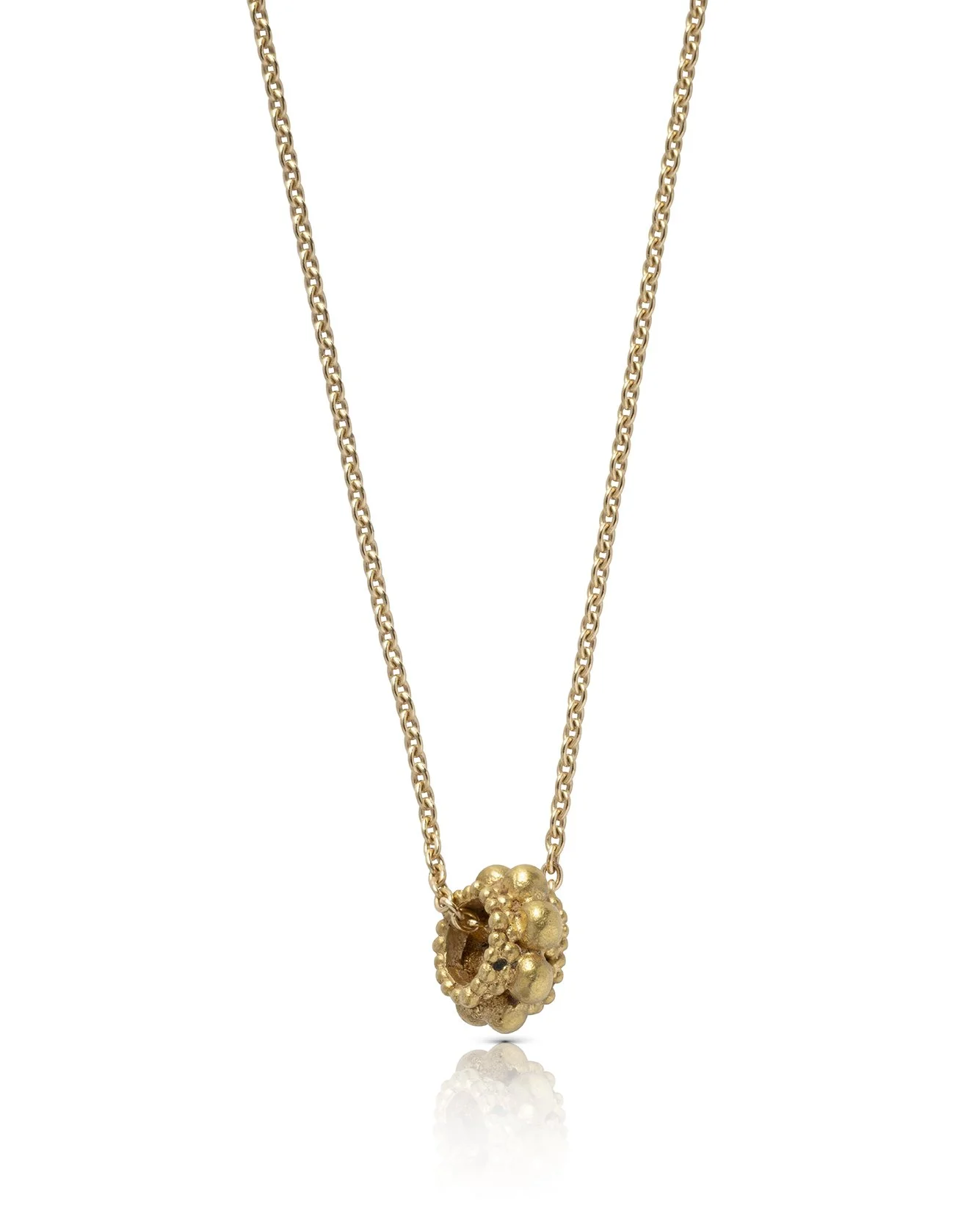 A Hellenistic gold bead set as a pendant