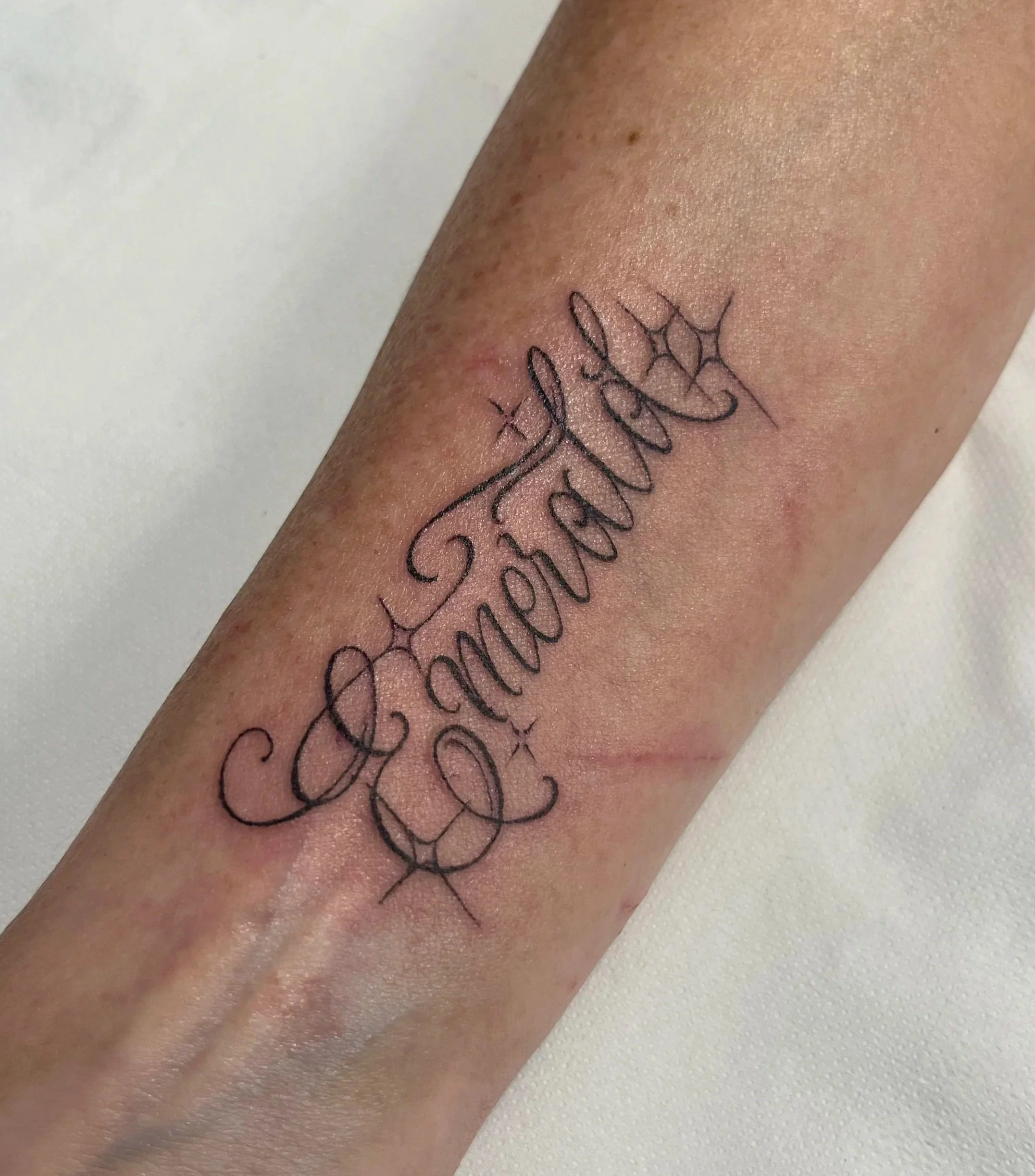 Chicano style lettering tattoo made in Bath 